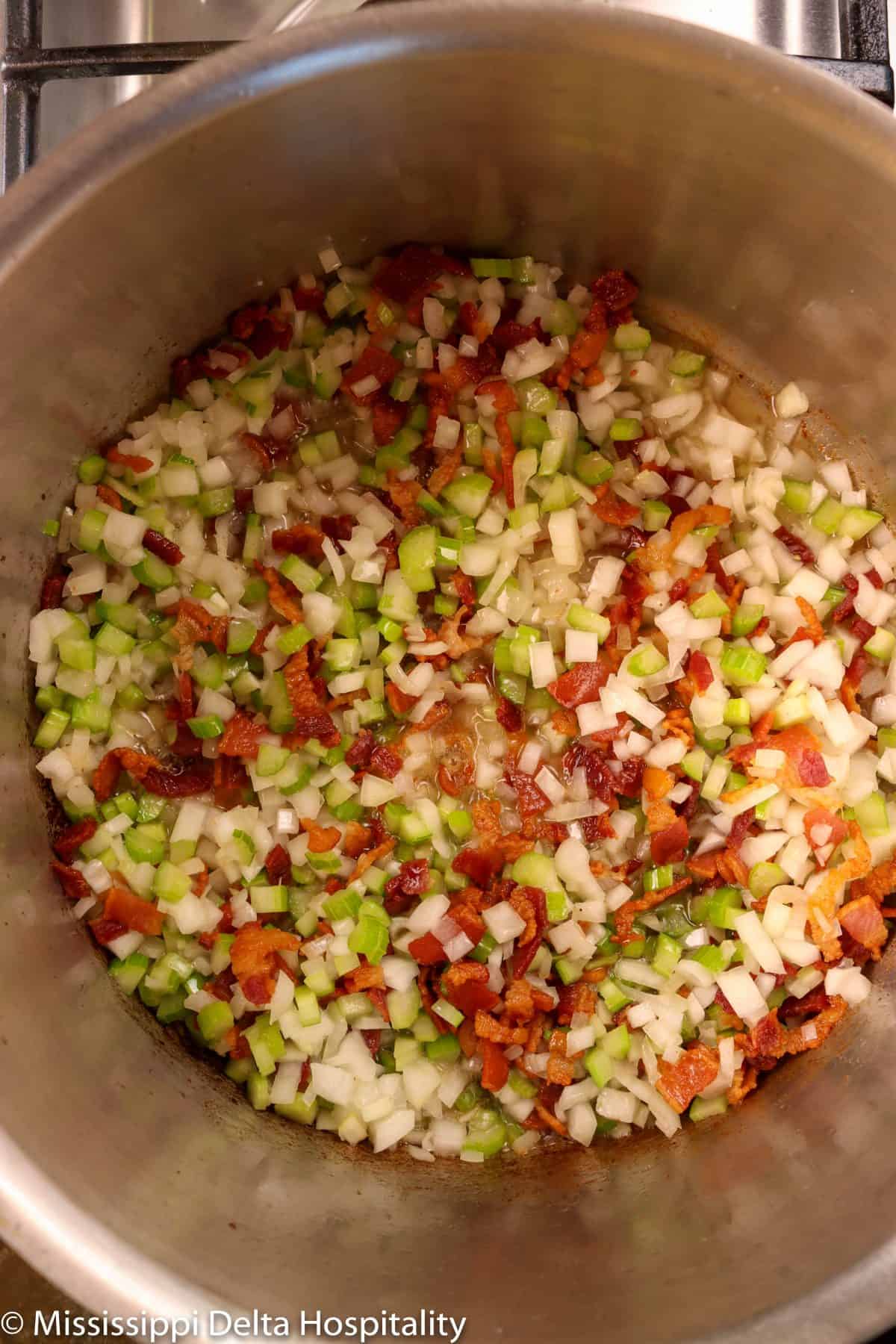 bacon, onions, and celery in a stock pot