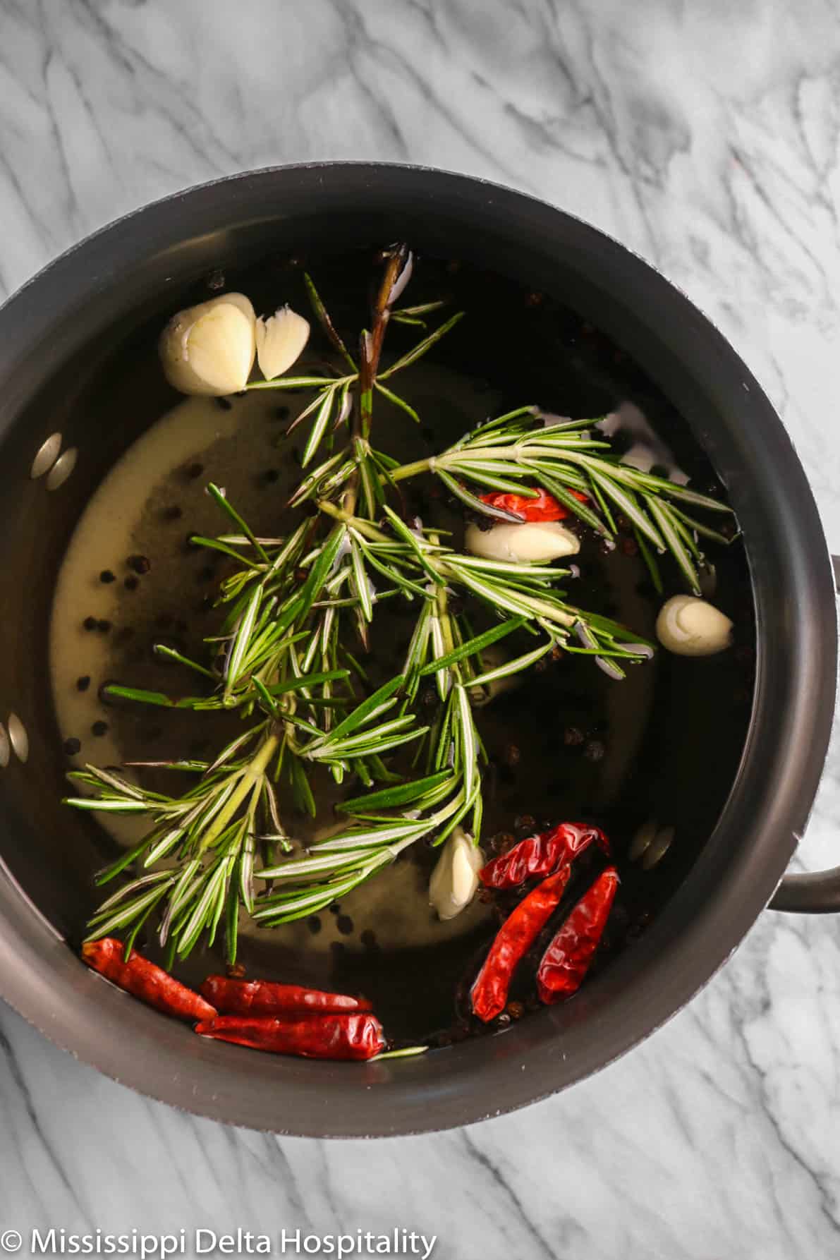 ingredients for a turkey brine in a large stock pot