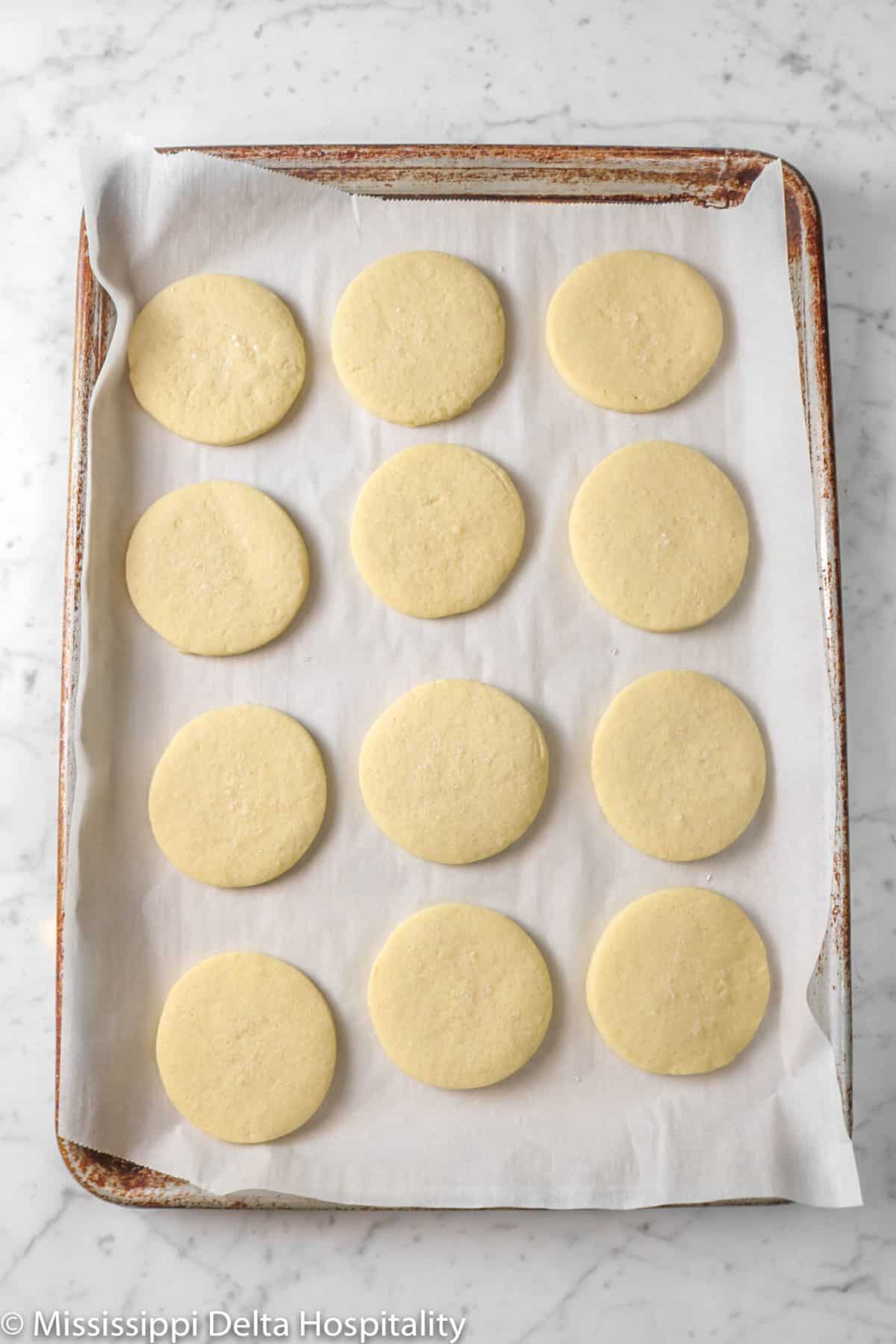 sugar cookies on a sheet pan