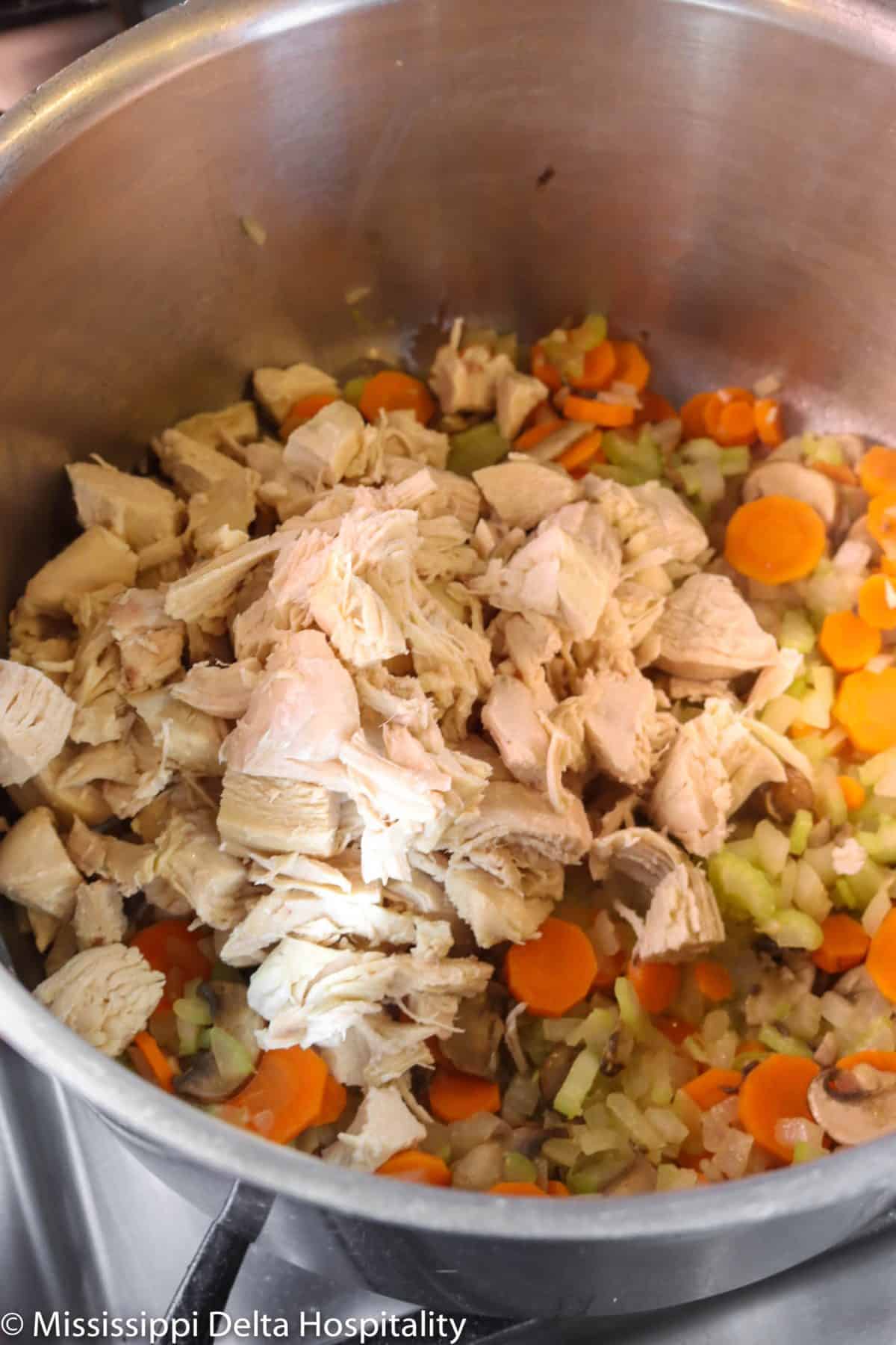 chicken added to vegetable mix