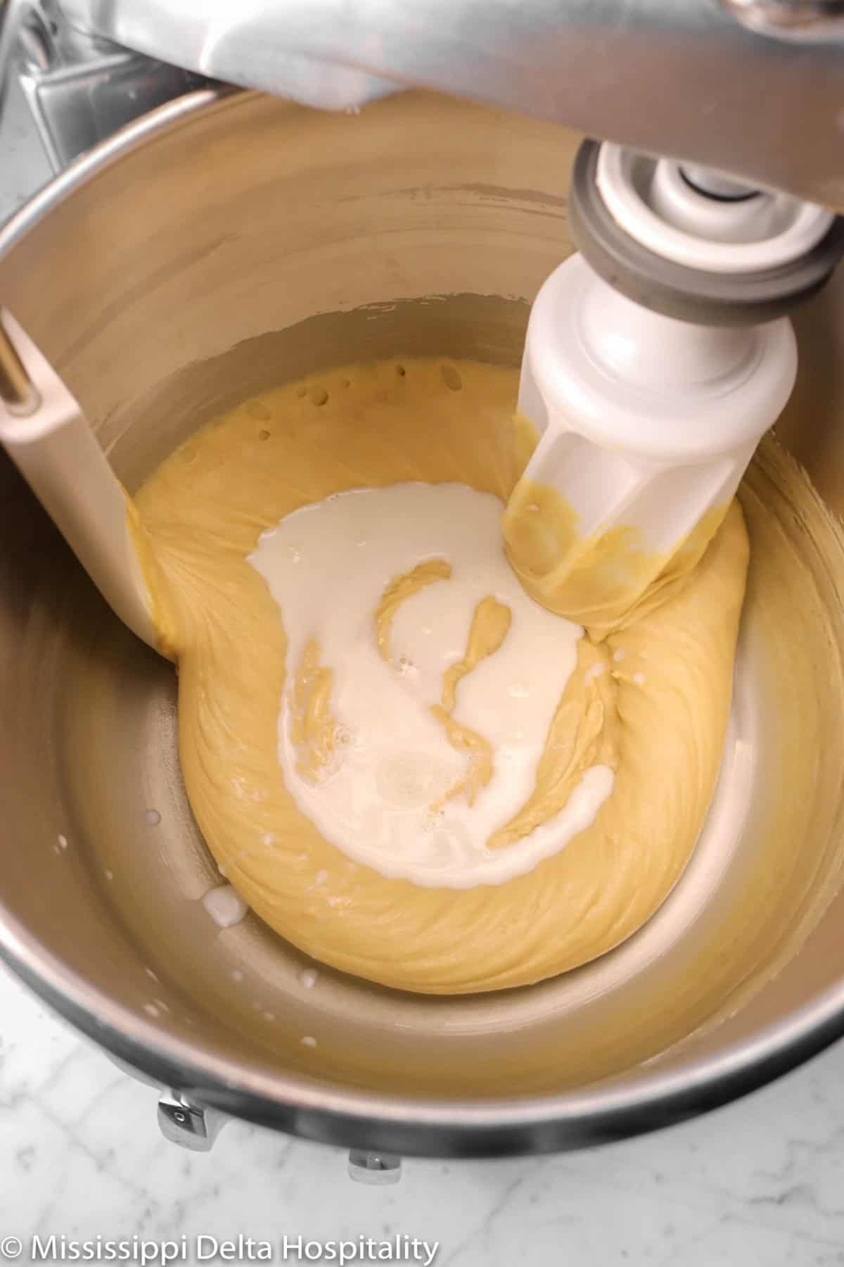 milk added to butter and flour mixture