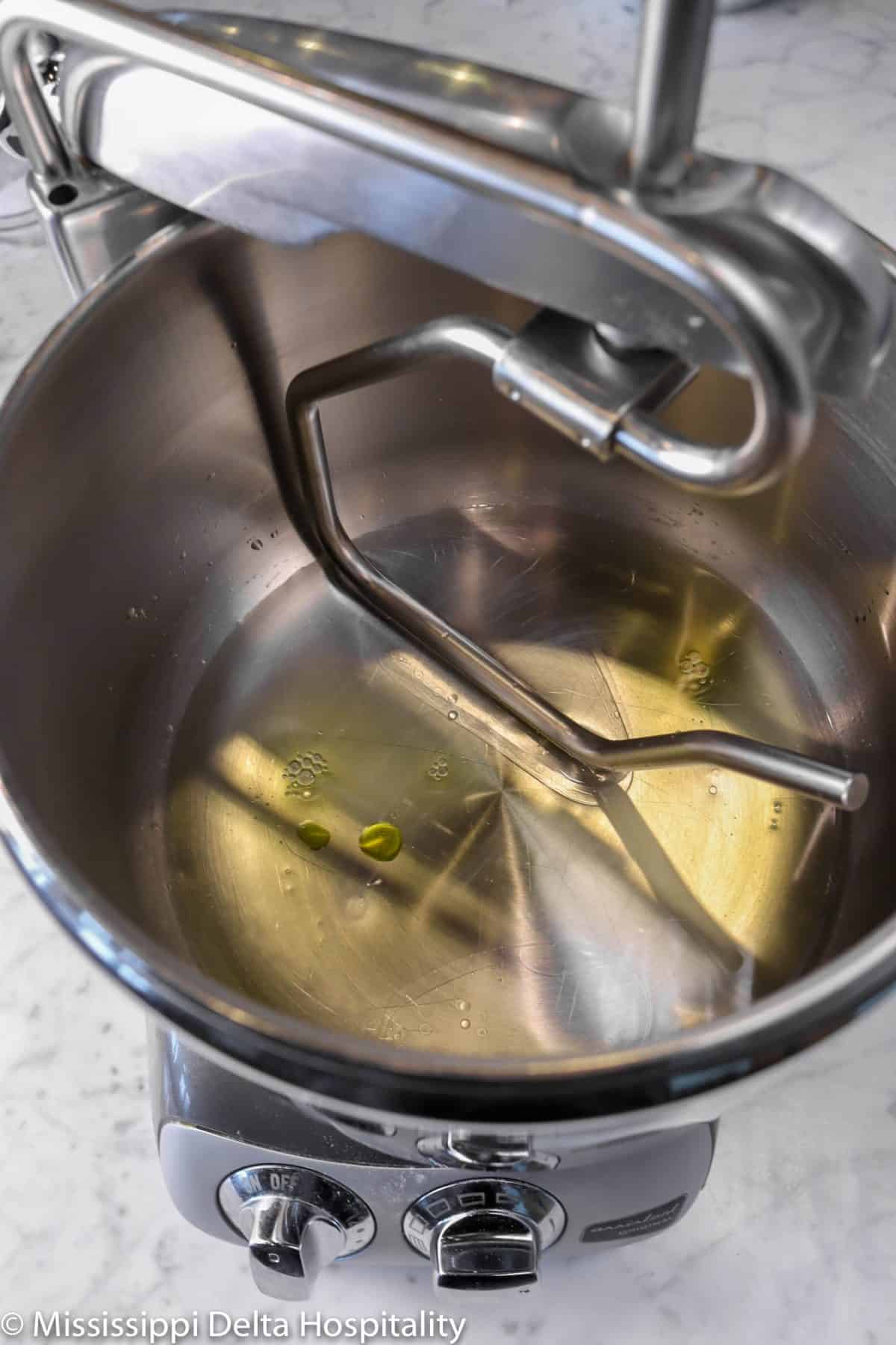 water and olive oil in a mixer
