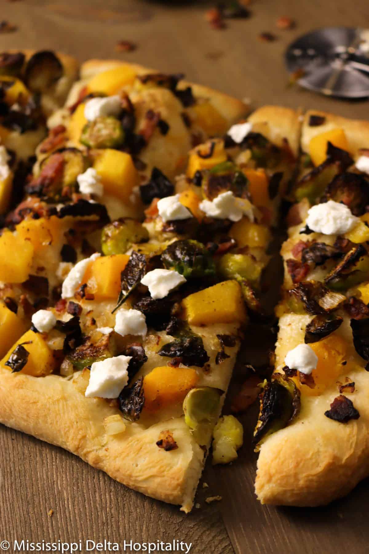 sliced butternut squash and brussel sprout flatbread