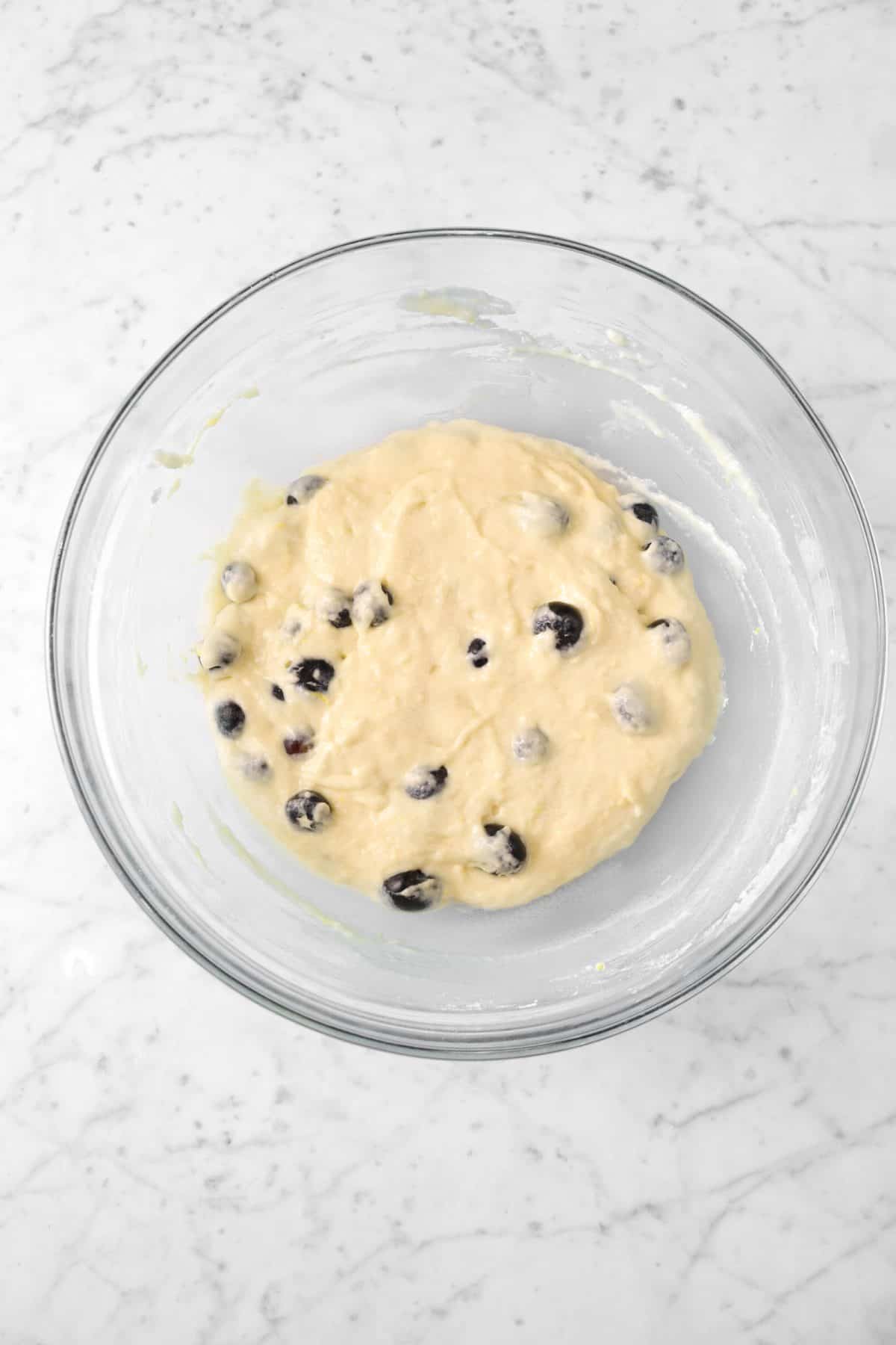 blueberry pancake batter in a glass bowl 
