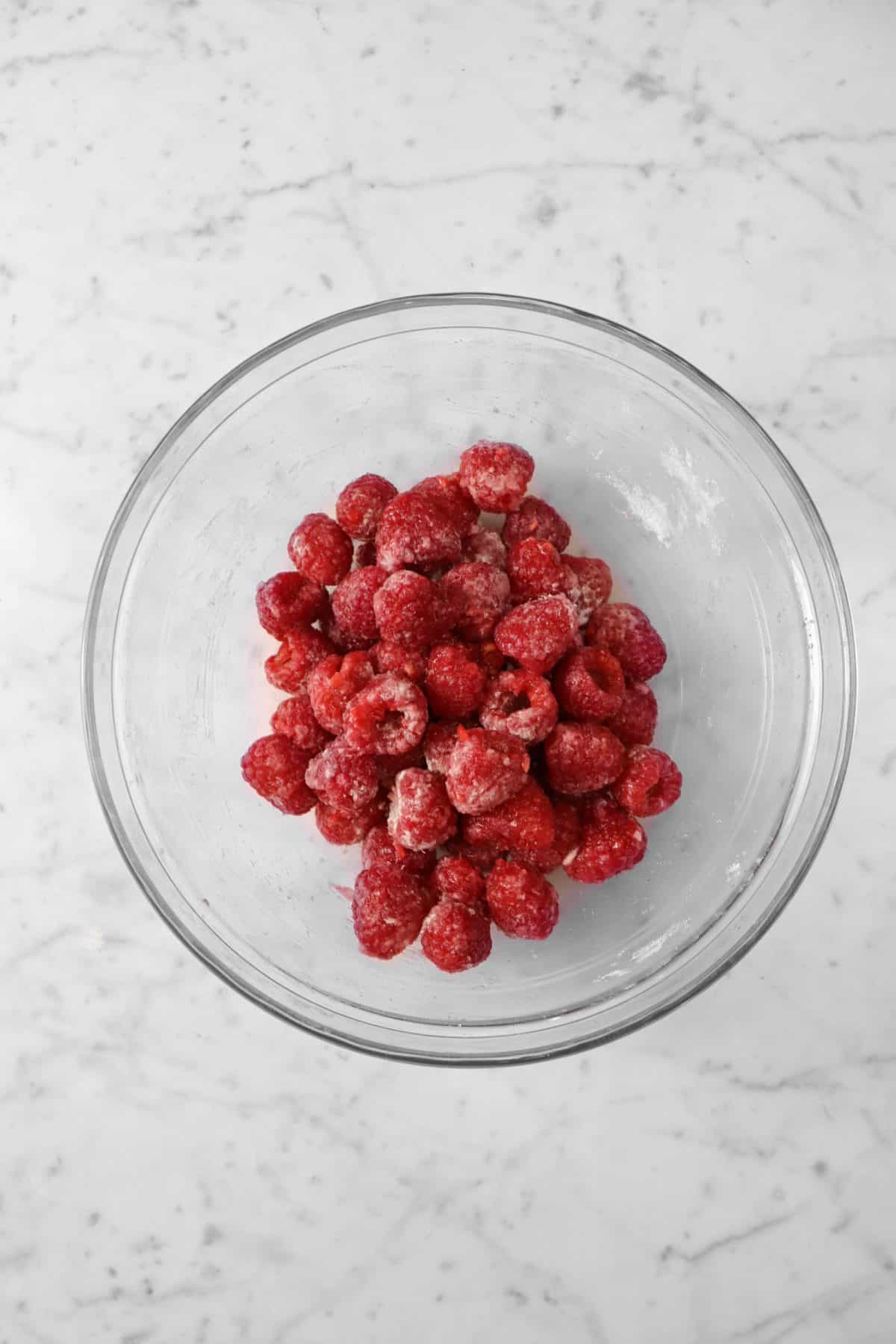 Raspberries, flour, and sugar mixed together