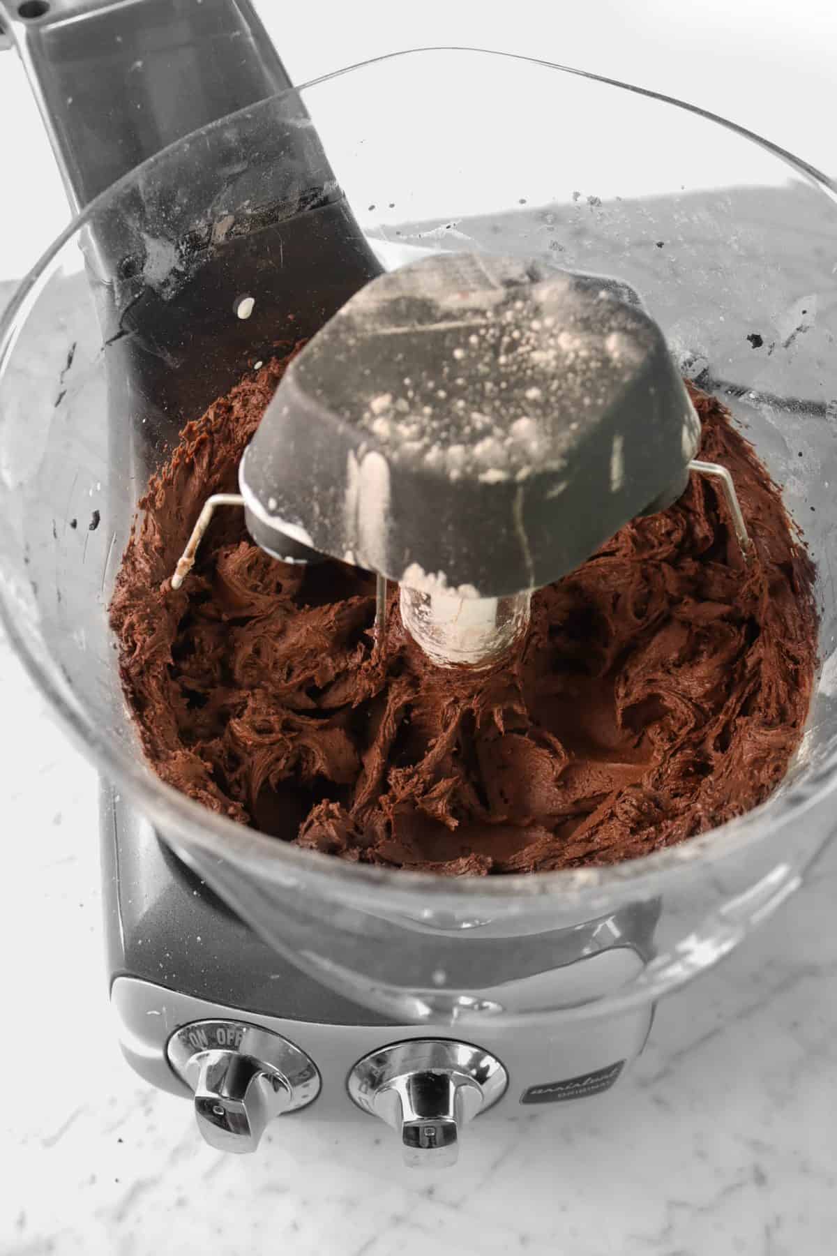 chocolate buttercream frosting in a mixer