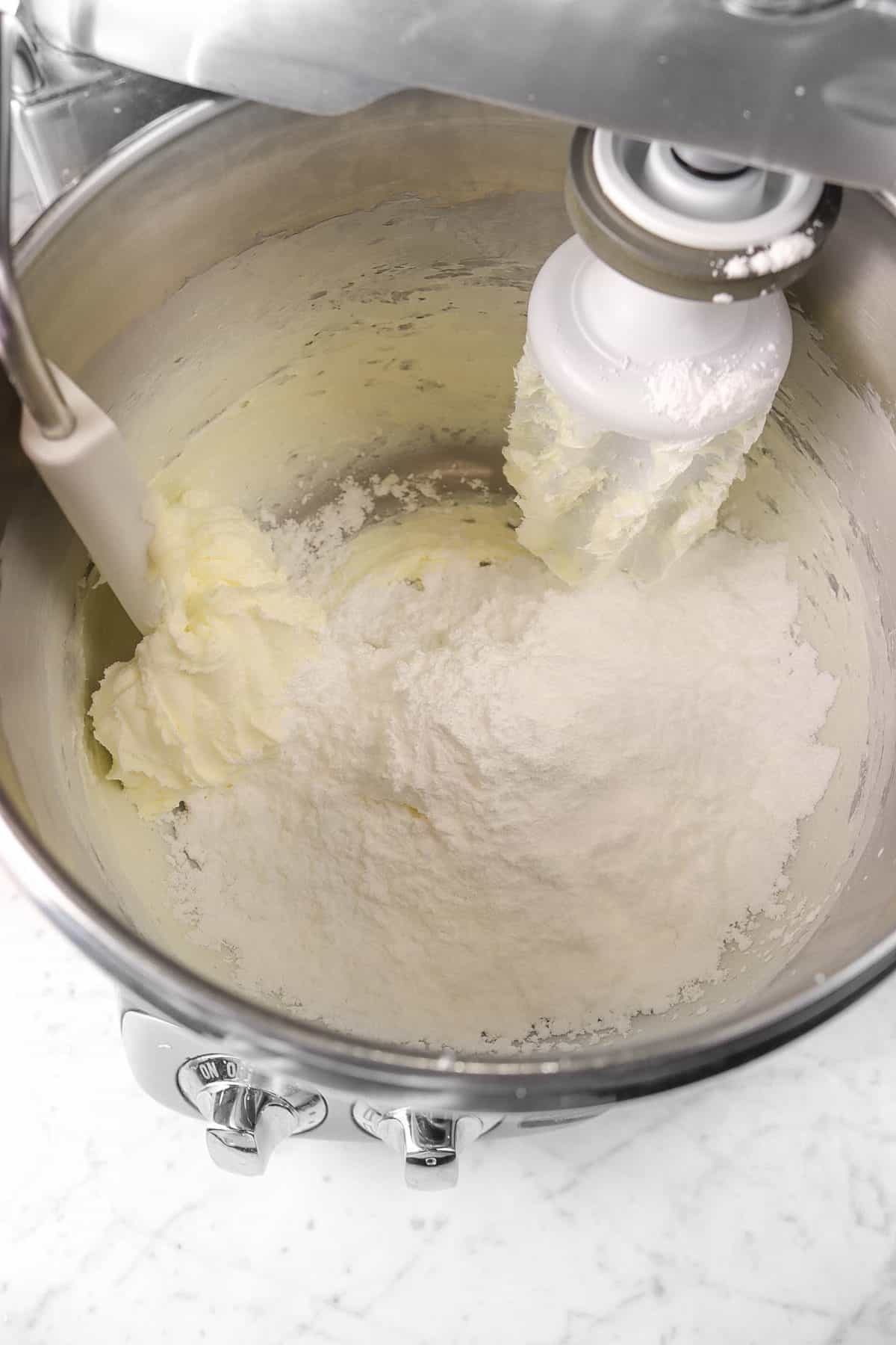 butter and powdered sugar in a mixer