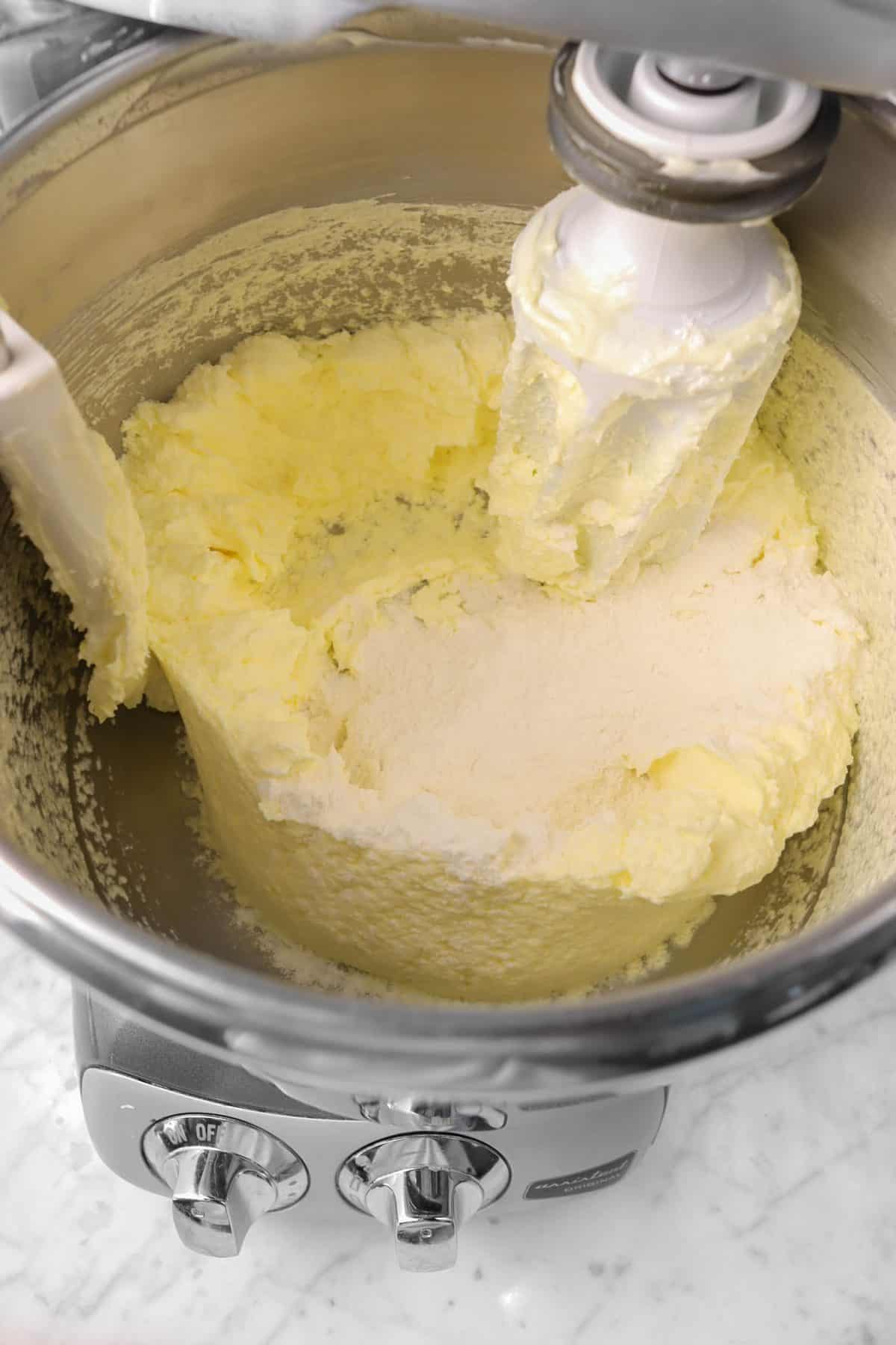 flour added to butter, sugar, and egg mixture