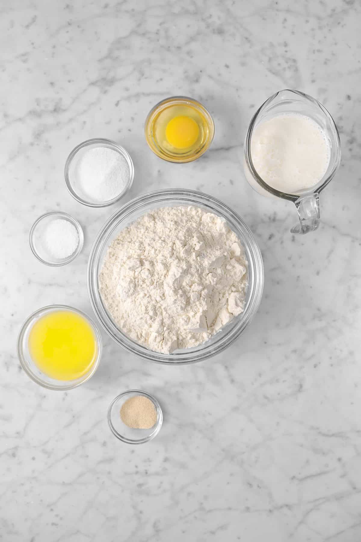 ingredients for buttermilk sandwich bread on a marble counter