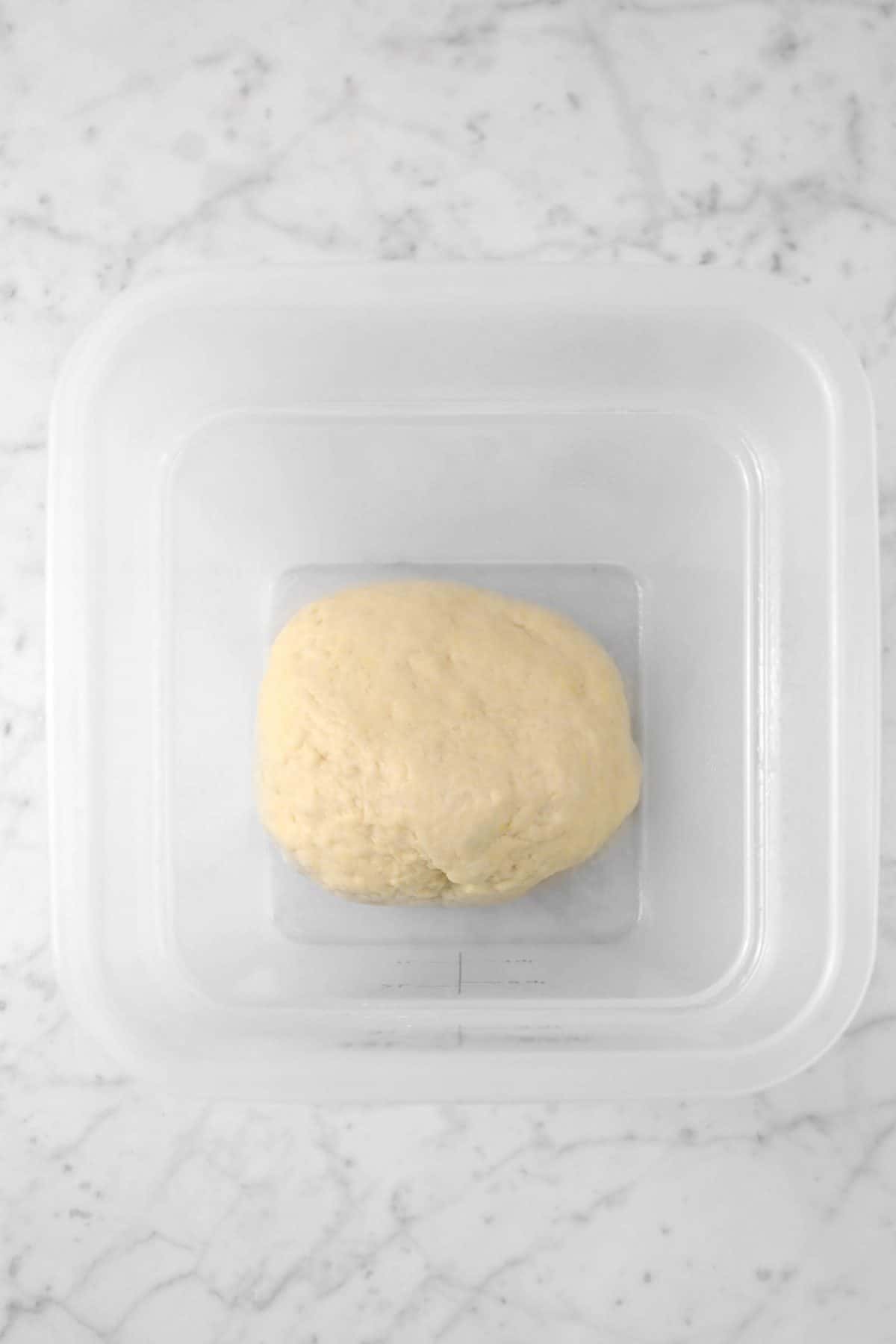 dough transferred  to a container