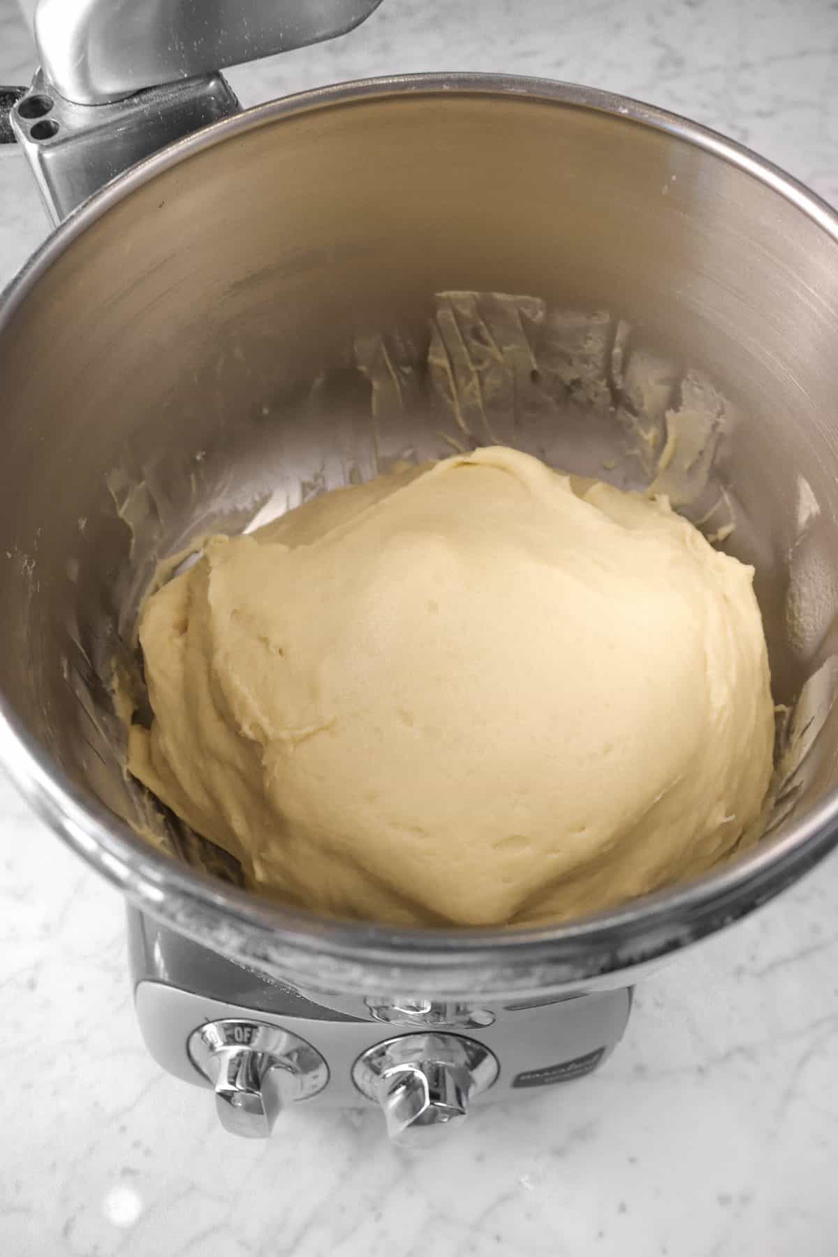 cinnamon roll dough in a mixer