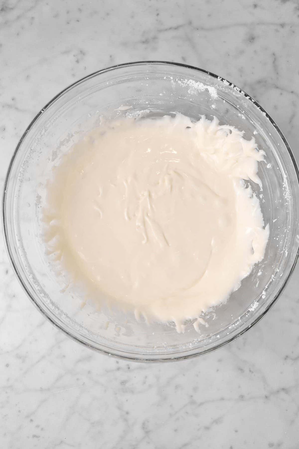 vanilla icing in a glass bowl 