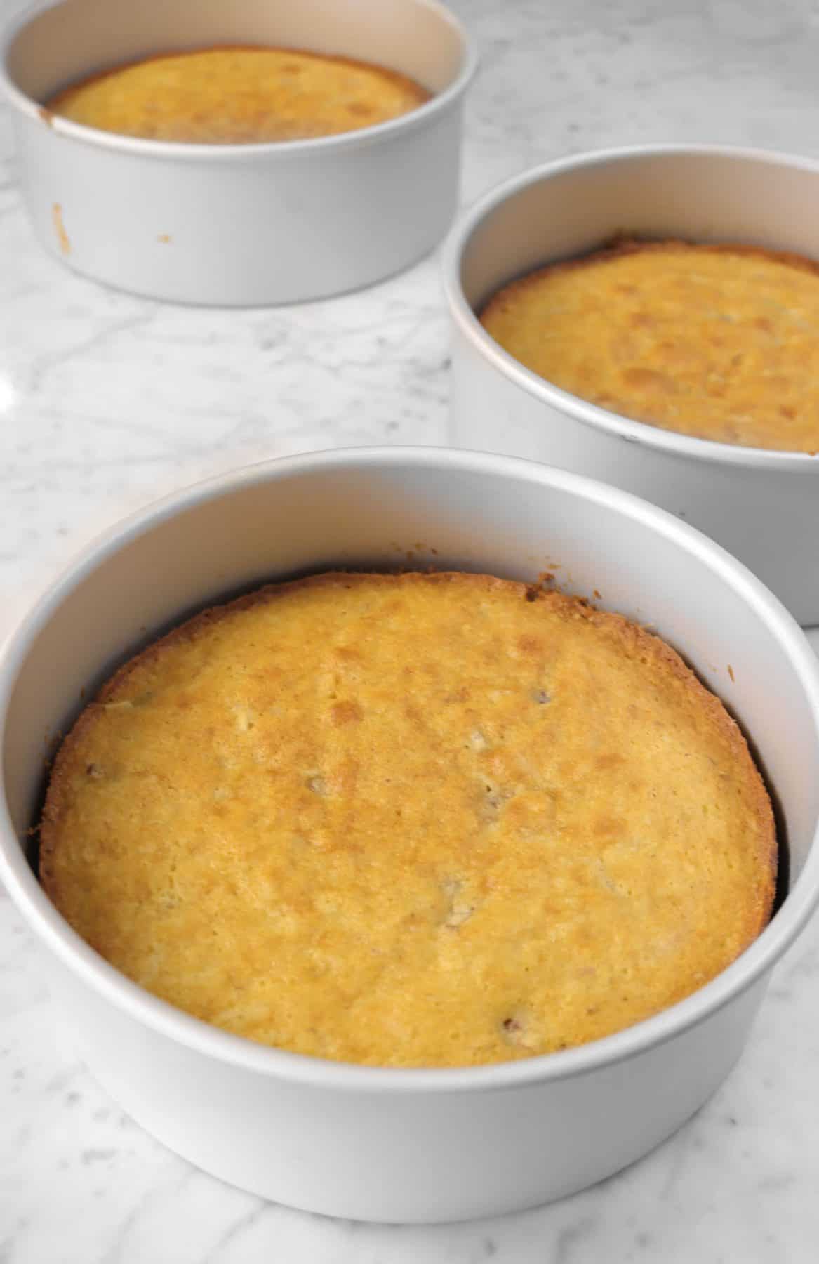 italian cream cake baked in round cake pans