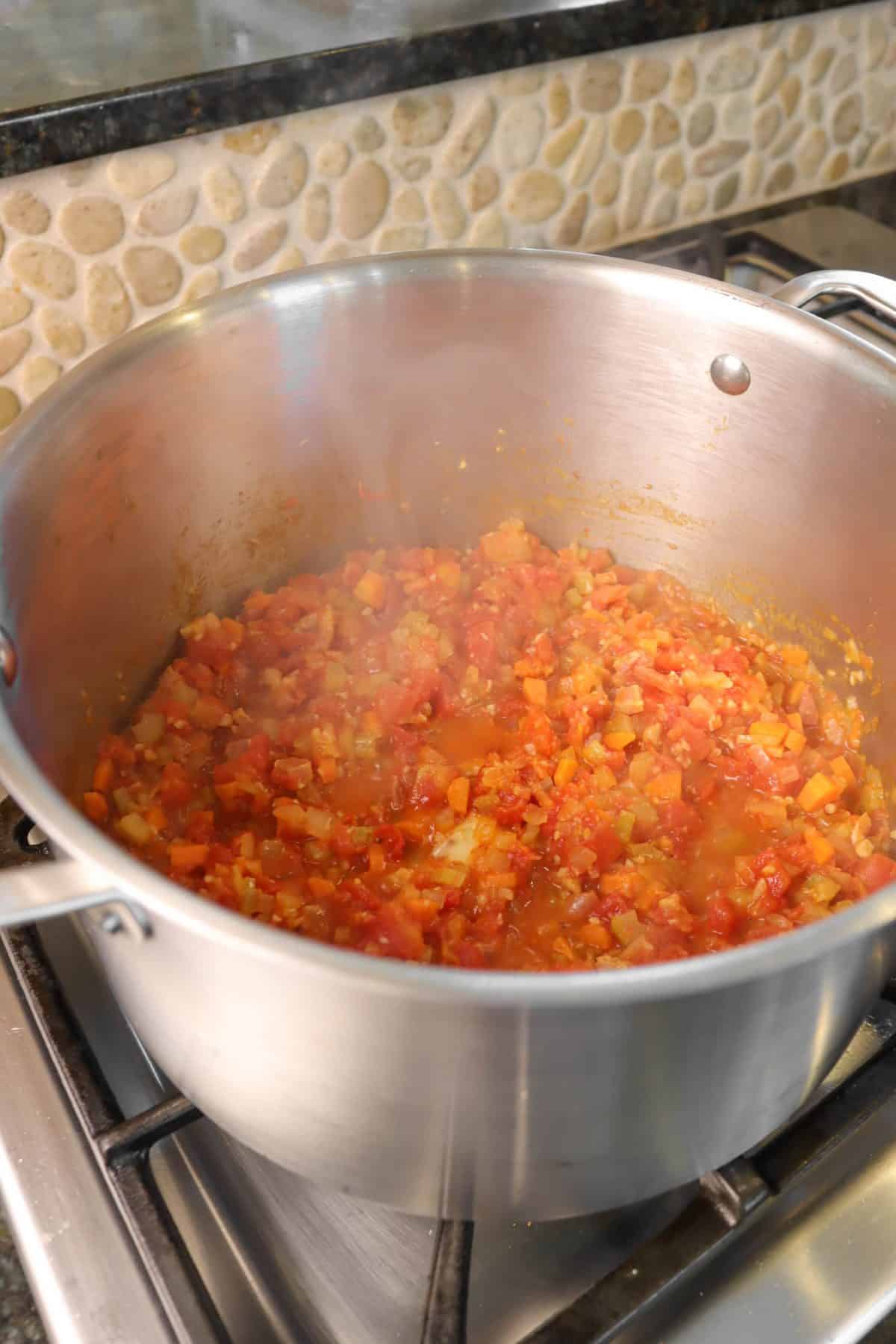 vegetables cooked down in a small stock pot