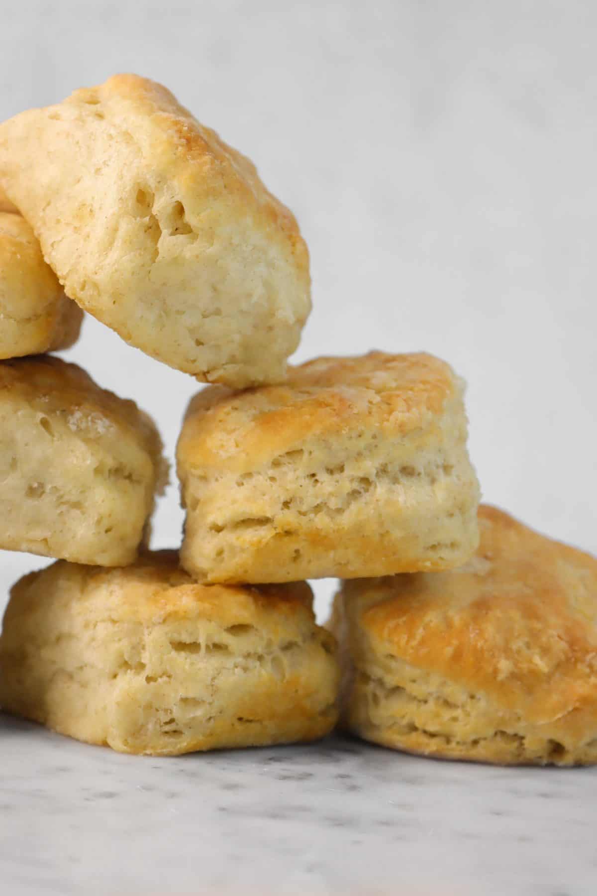 biscuits stacked on top of each other on a marble counter