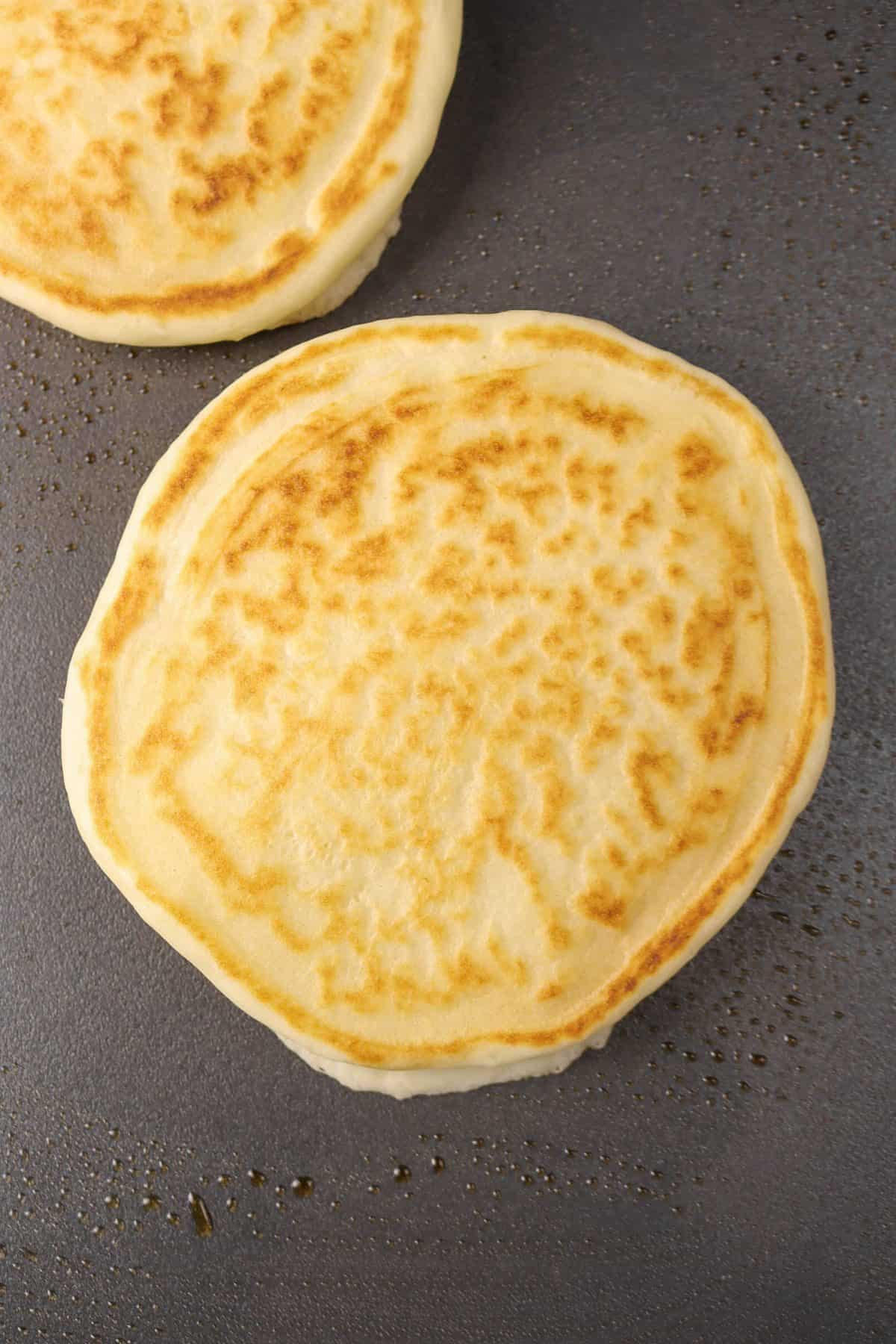 a sourdough pancake on a griddle