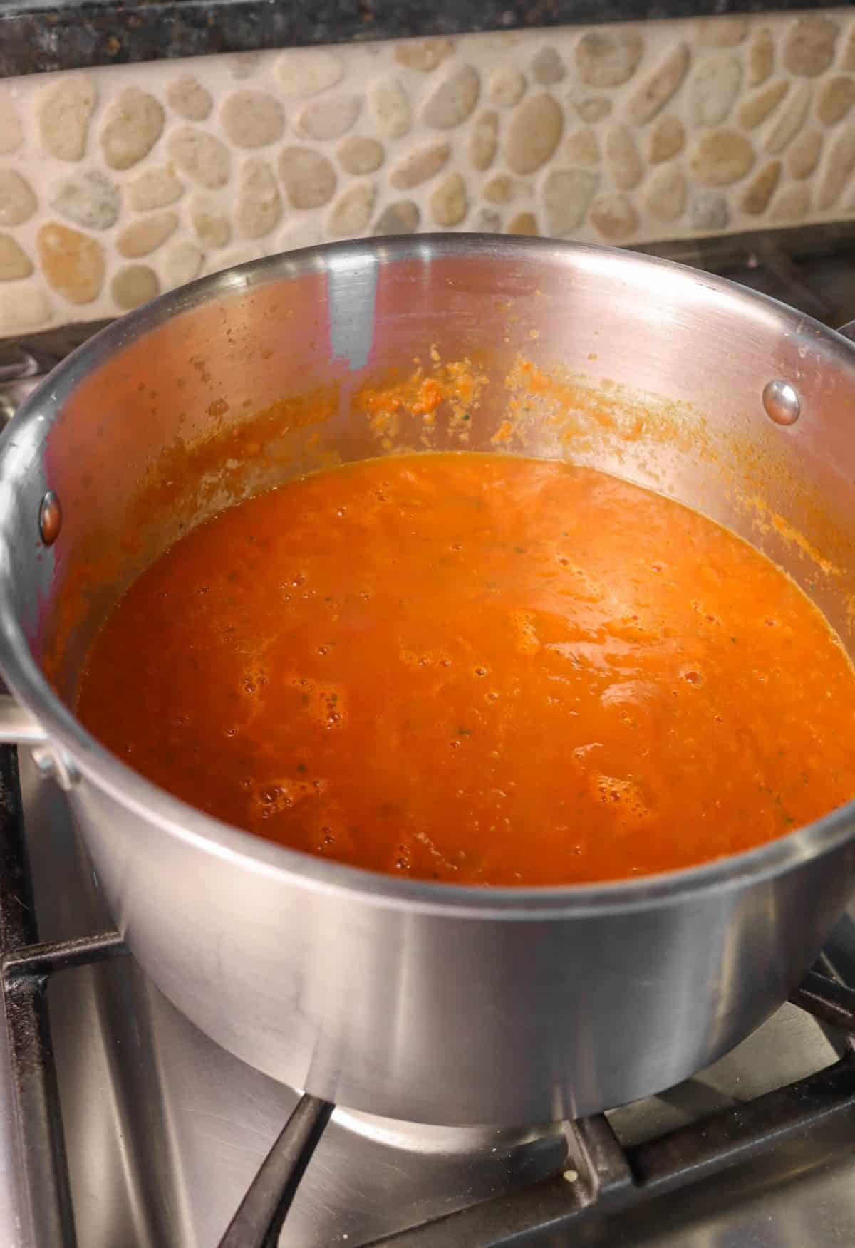 tomato soup in a stock pot