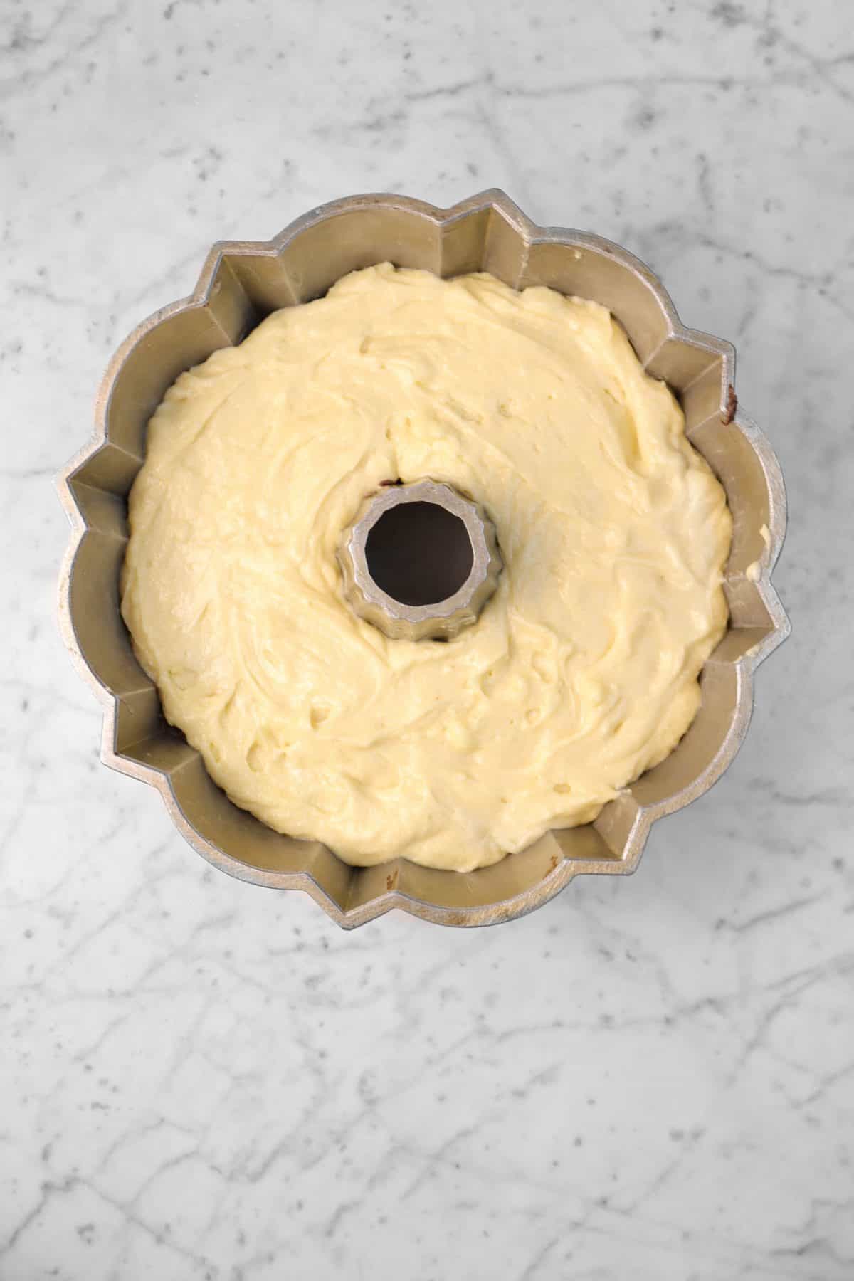 another layer of vanilla cake batter added to bundt pan