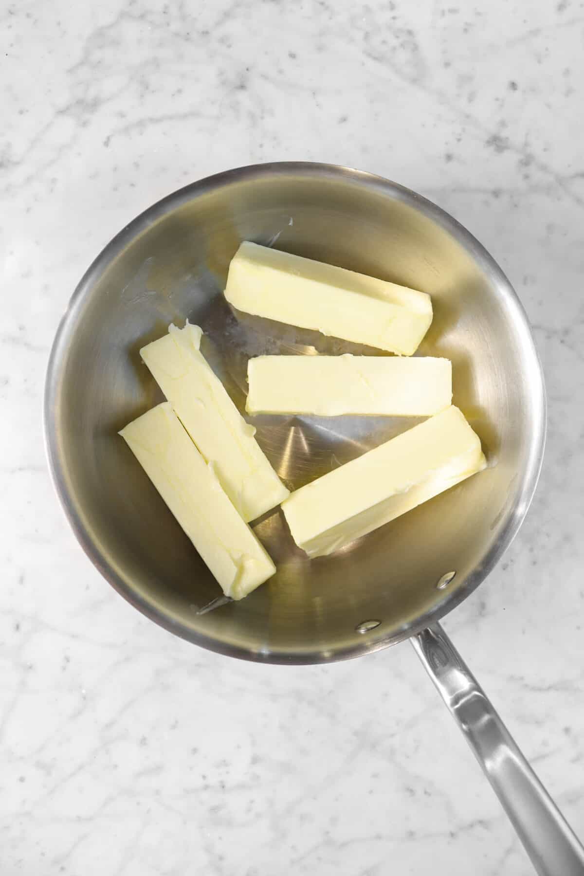 five sticks of butter in a sauce pan