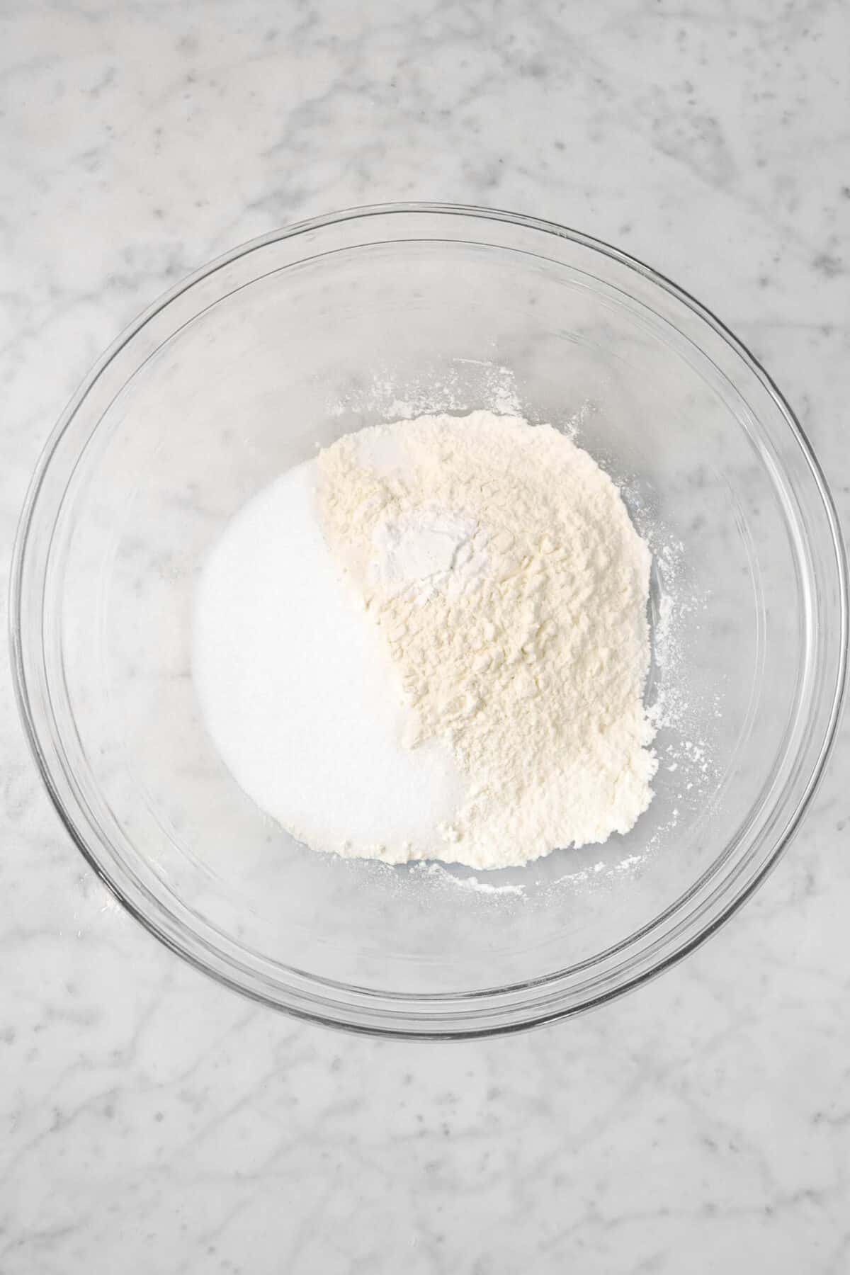 flour, sugar, salt, and baking powder in a glass bowl