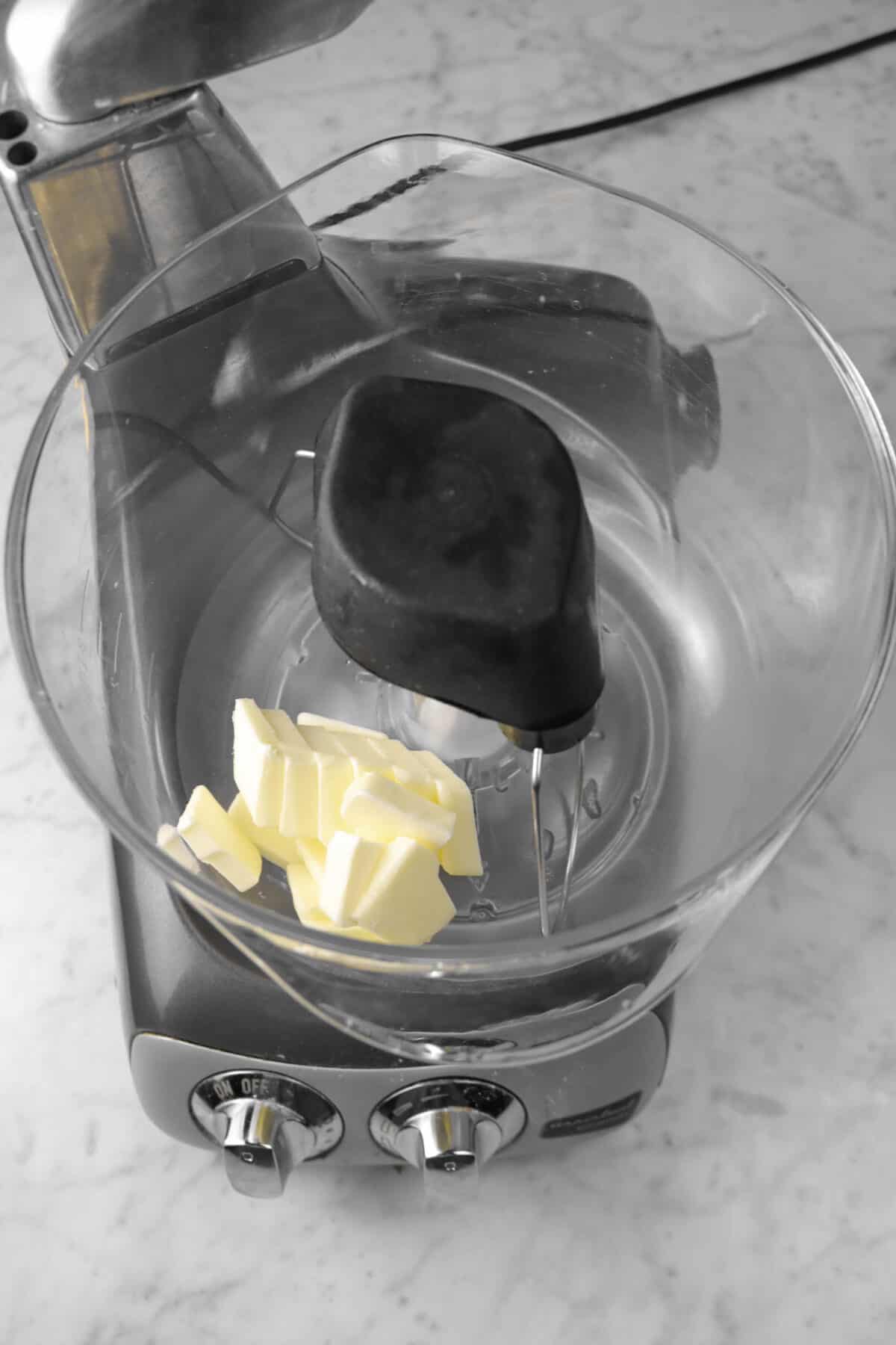 sliced butter in a mixer