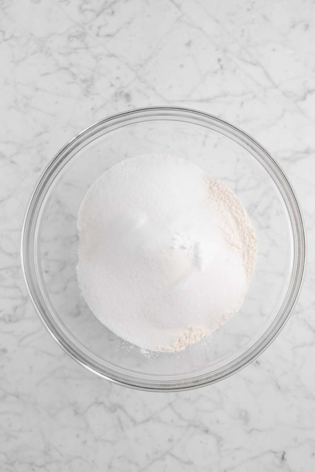 flour, salt, sugar, baking powder, and baking soda in a glass bowl