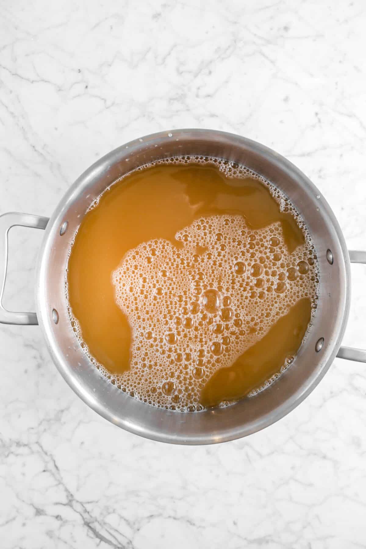 apple cider in a large stock pot