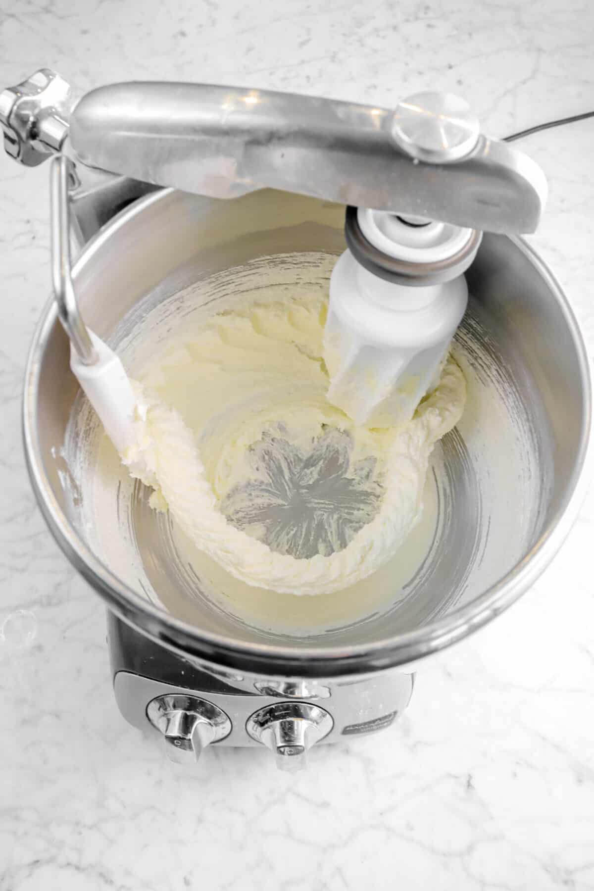 butter and sugar mixed in a mixer
