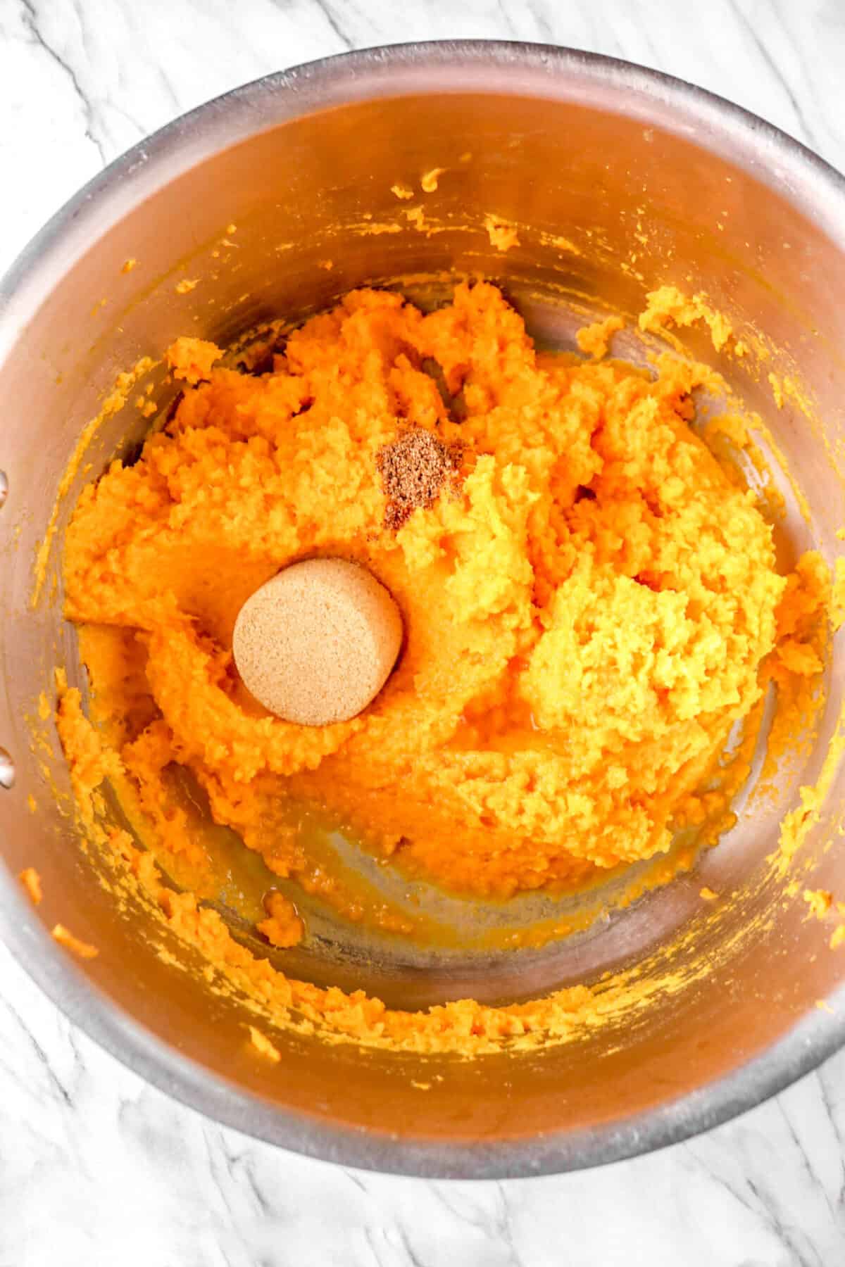 brown sugar, nutmeg, and bourbon added to sweet potatoes