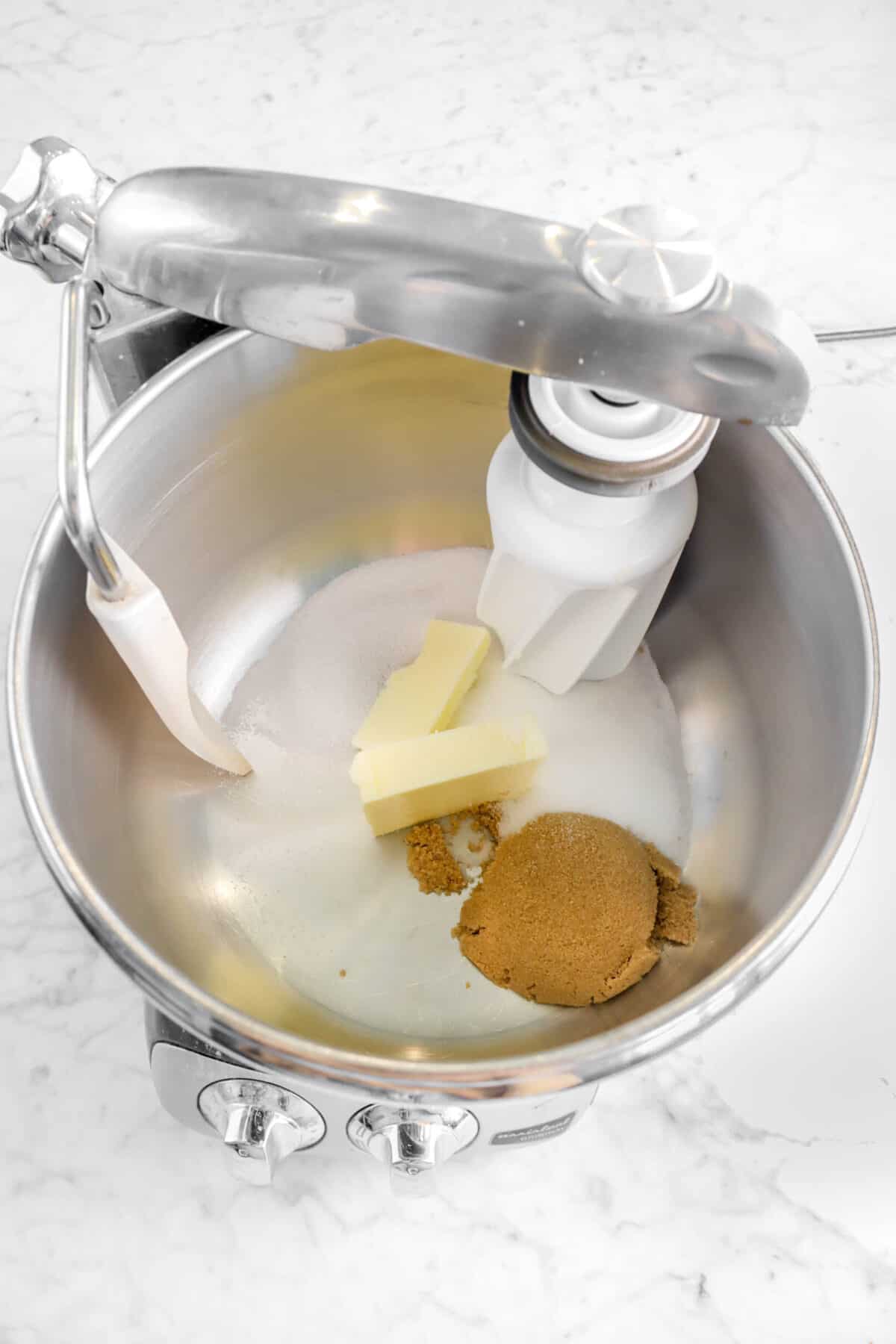 sugar, brown sugar, and butter in a mixer
