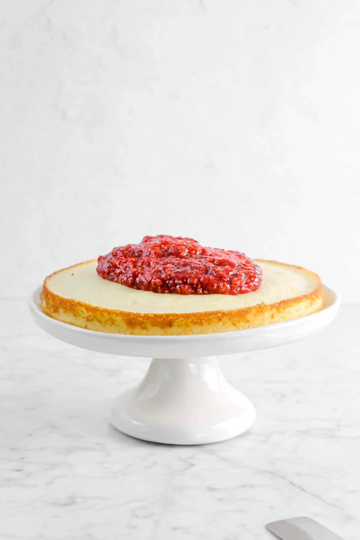 raspberry jam added to cake layer