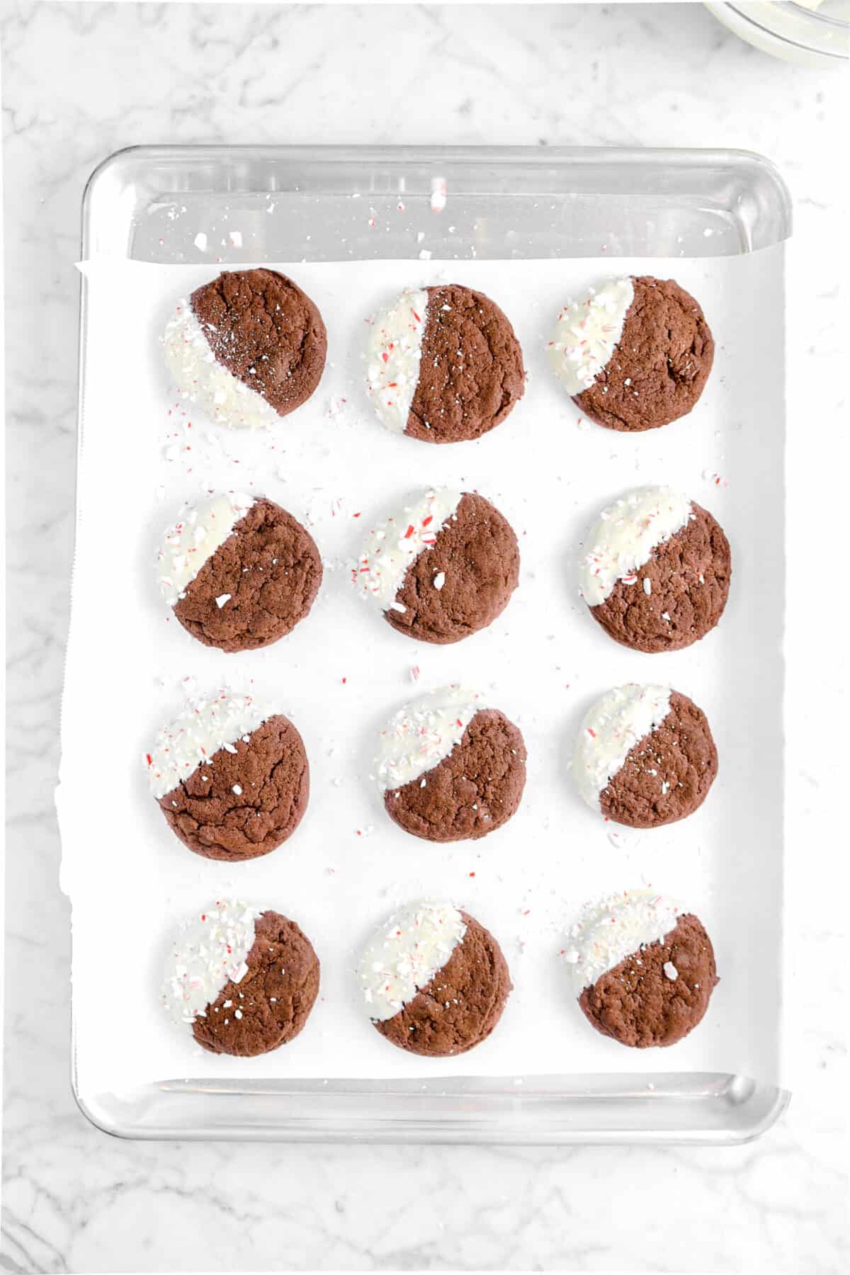 chocolate cookies dipped in white chocolate and topped with pepperint