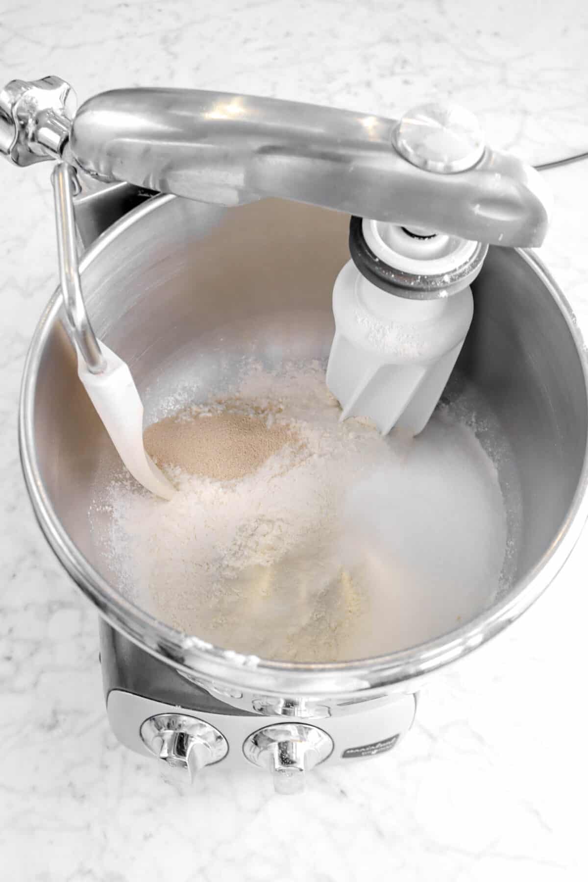 yeast, flour, and sugar in mixer