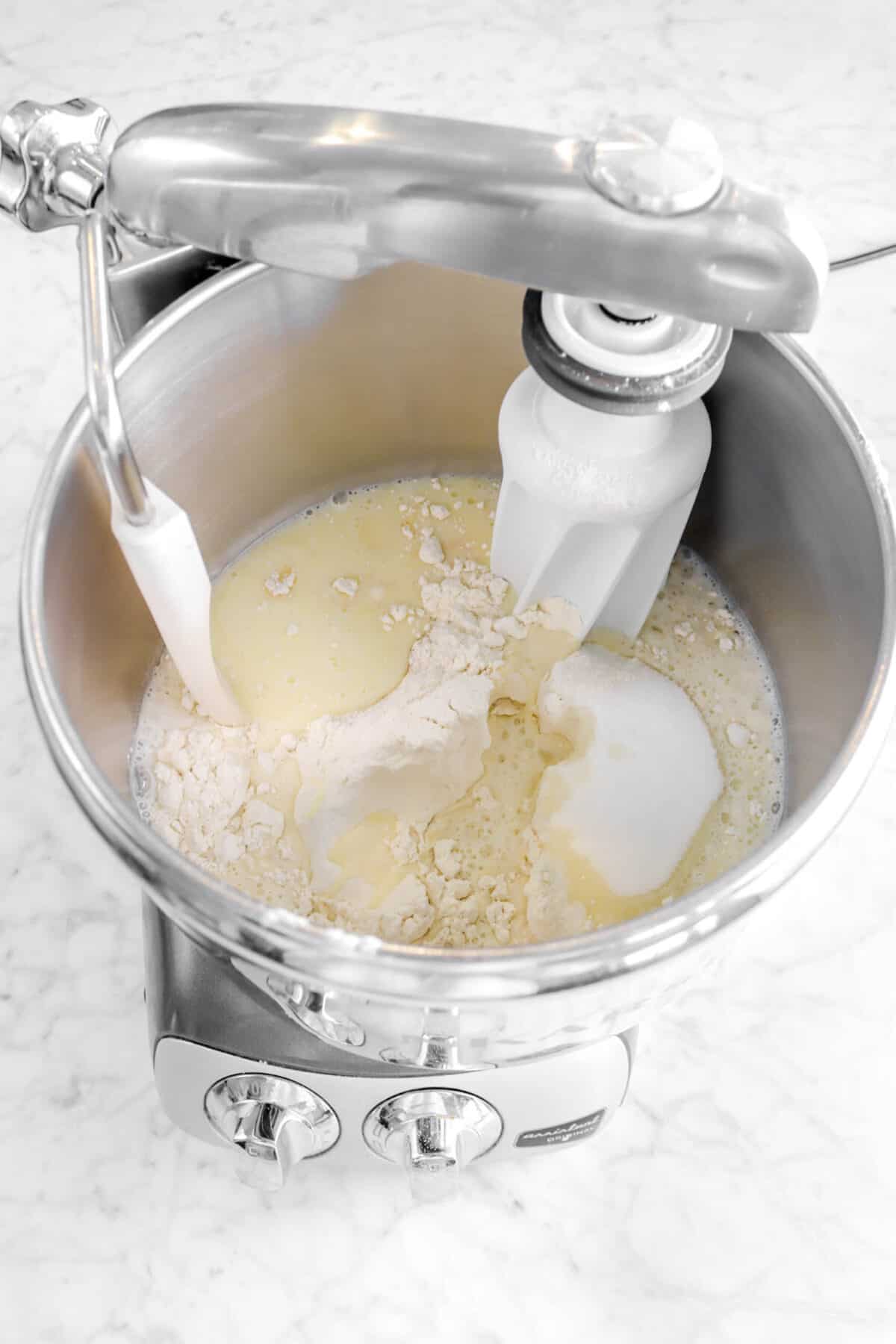 melted butter and milk mixture added to dry ingredients in mixer