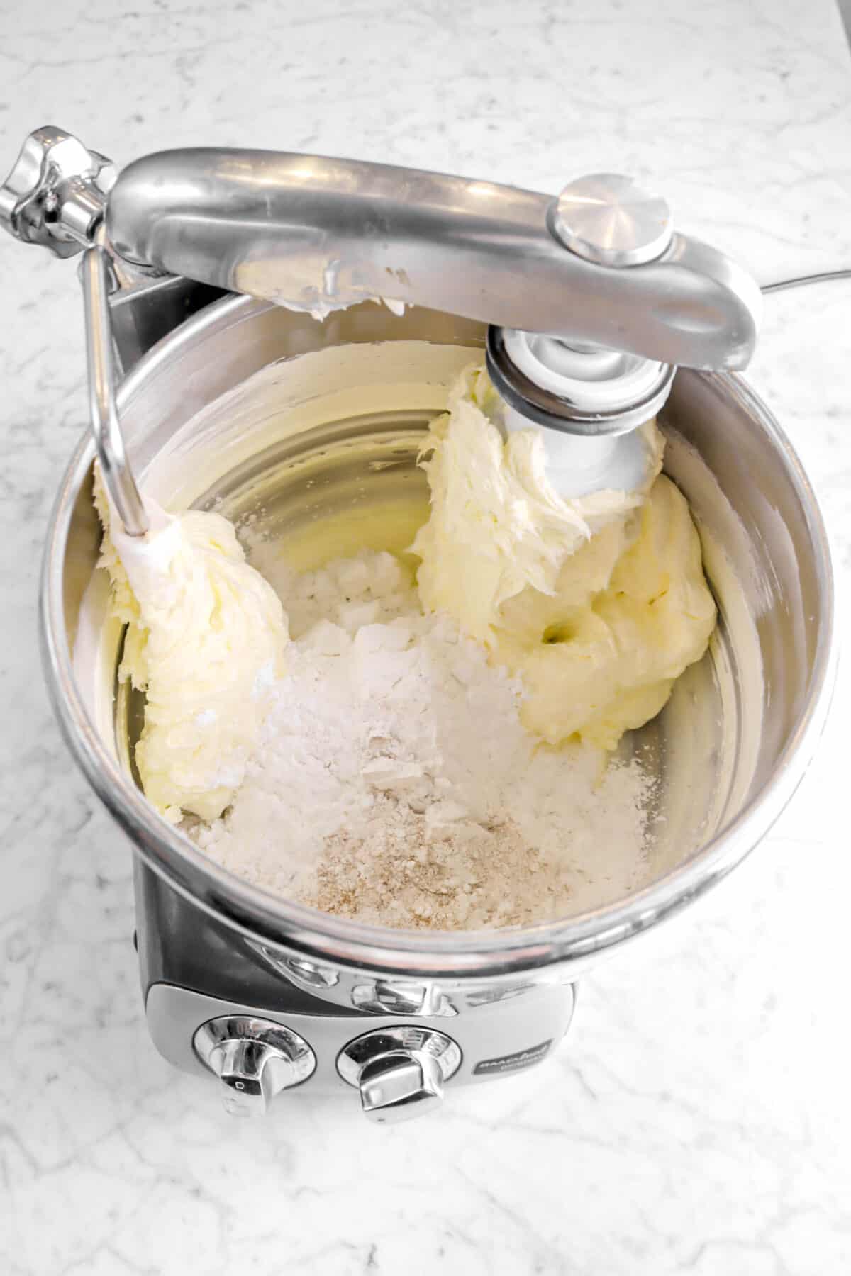 Powdered sugar mixture added to butter