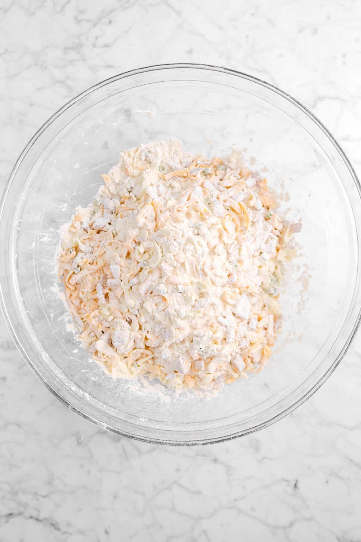 bacon, cheddar, and chives stirred into flour mixture