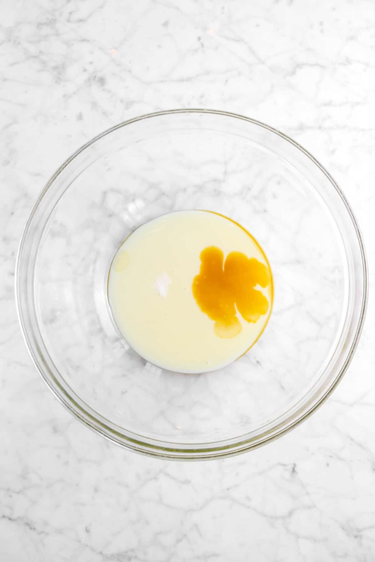 condensed milk, salt, and vanilla in glass bowl