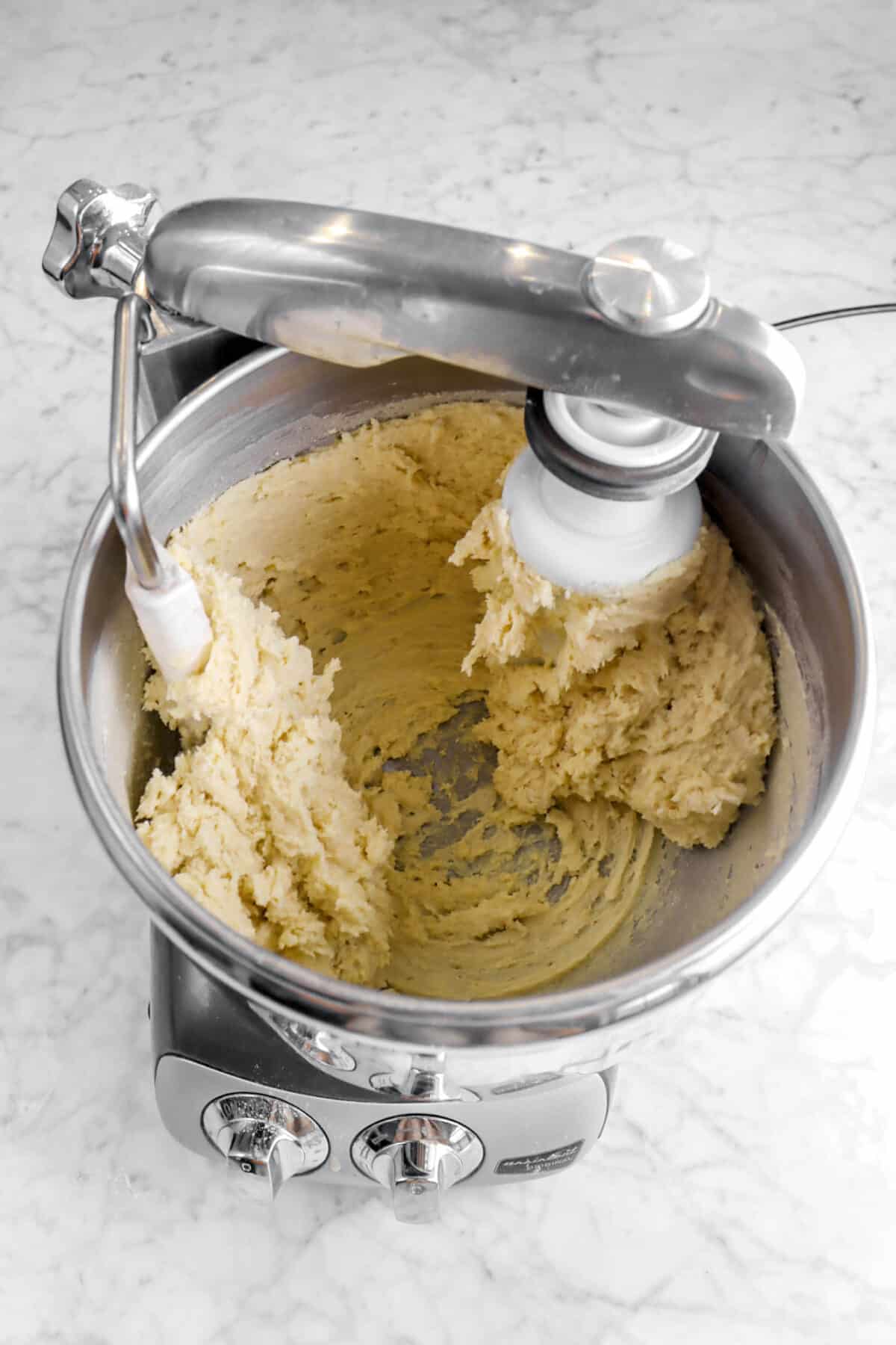 thick cake batter in mixer bowl