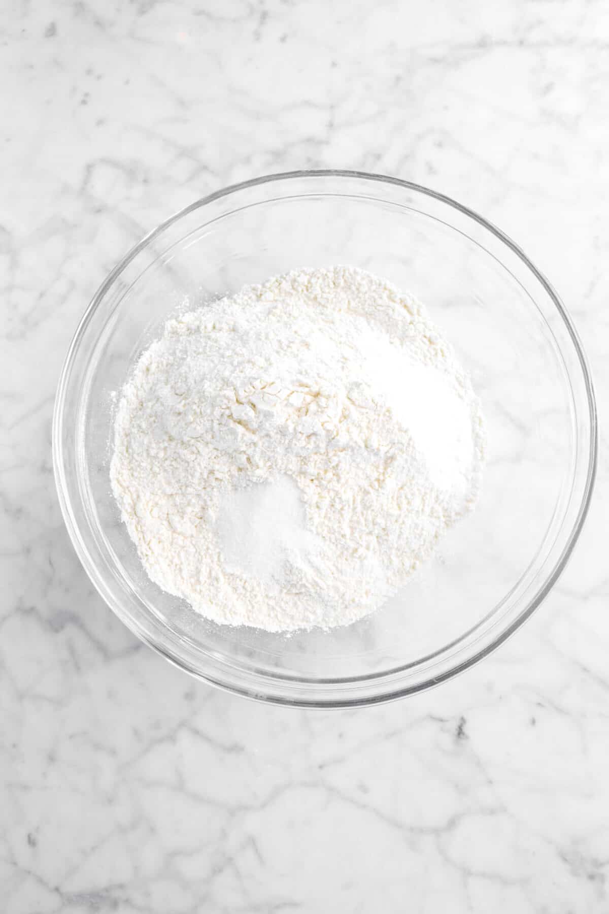 flour, salt, and baking soda in a glass bowl
