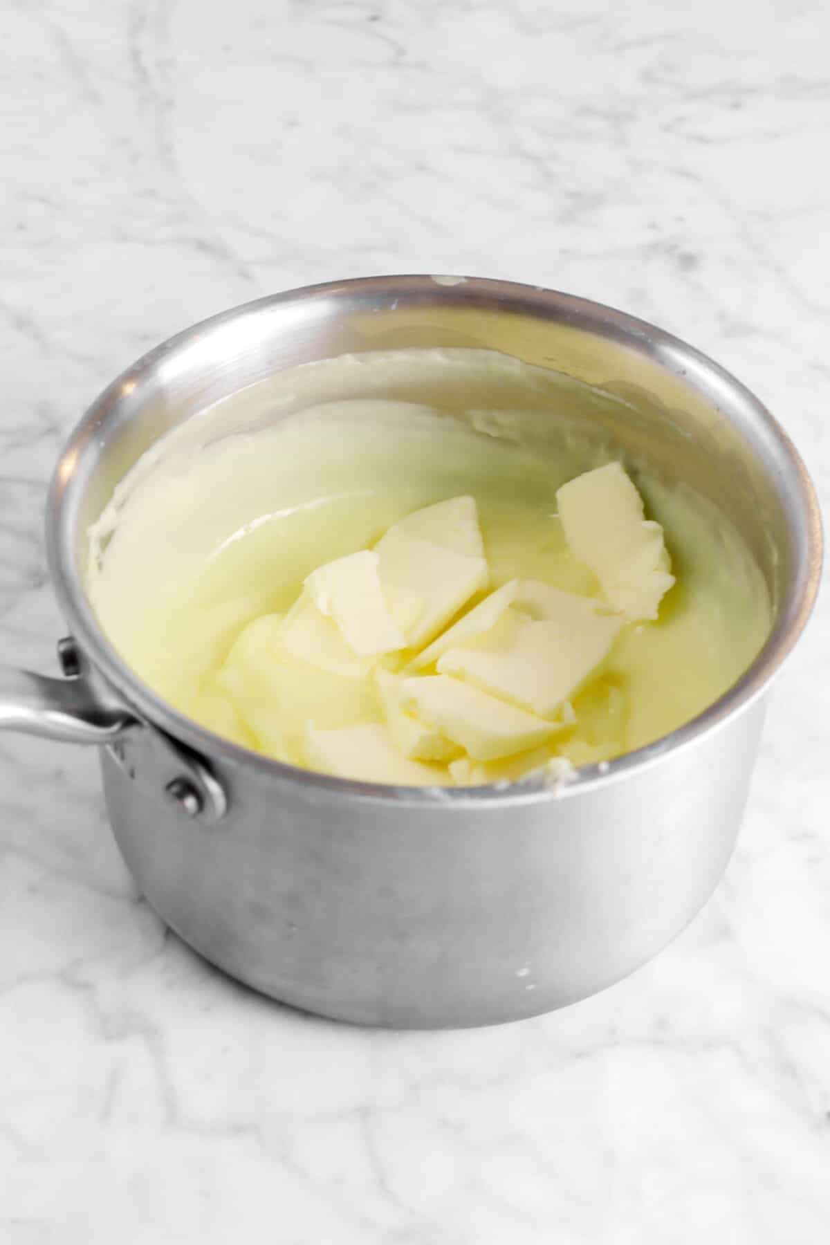 butter added custard in a small pot