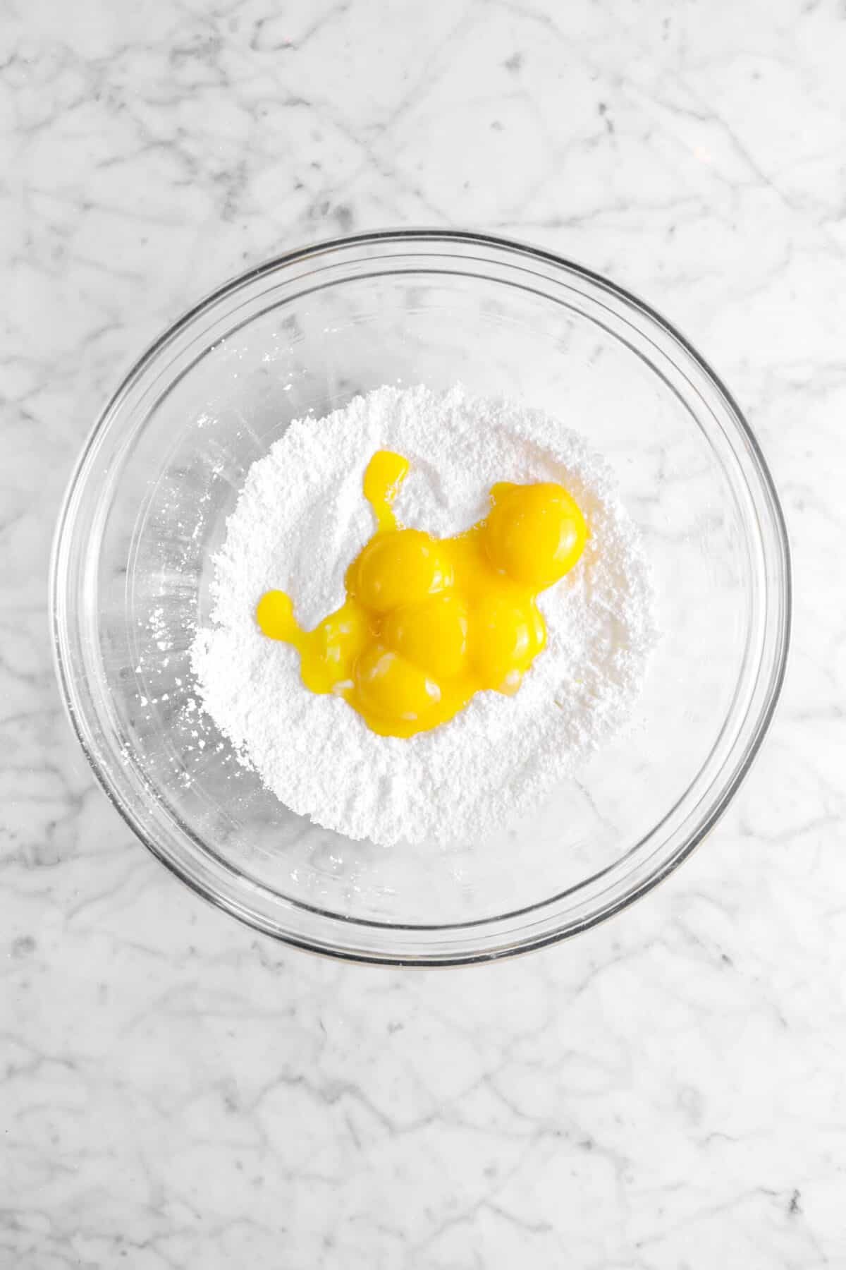 egg yolks in on top of corn starch mixture