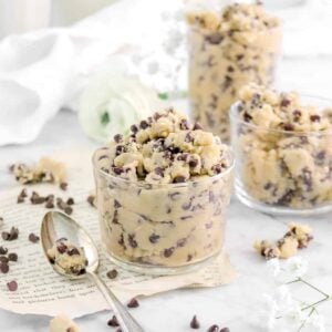 edible chocolate chip cookie dough on book pages with chocolate chips