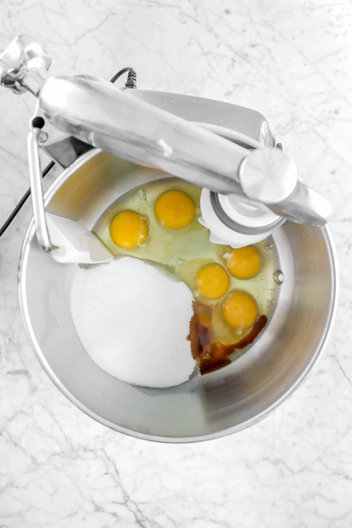 eggs, sugar, and vanilla in mixer bowl