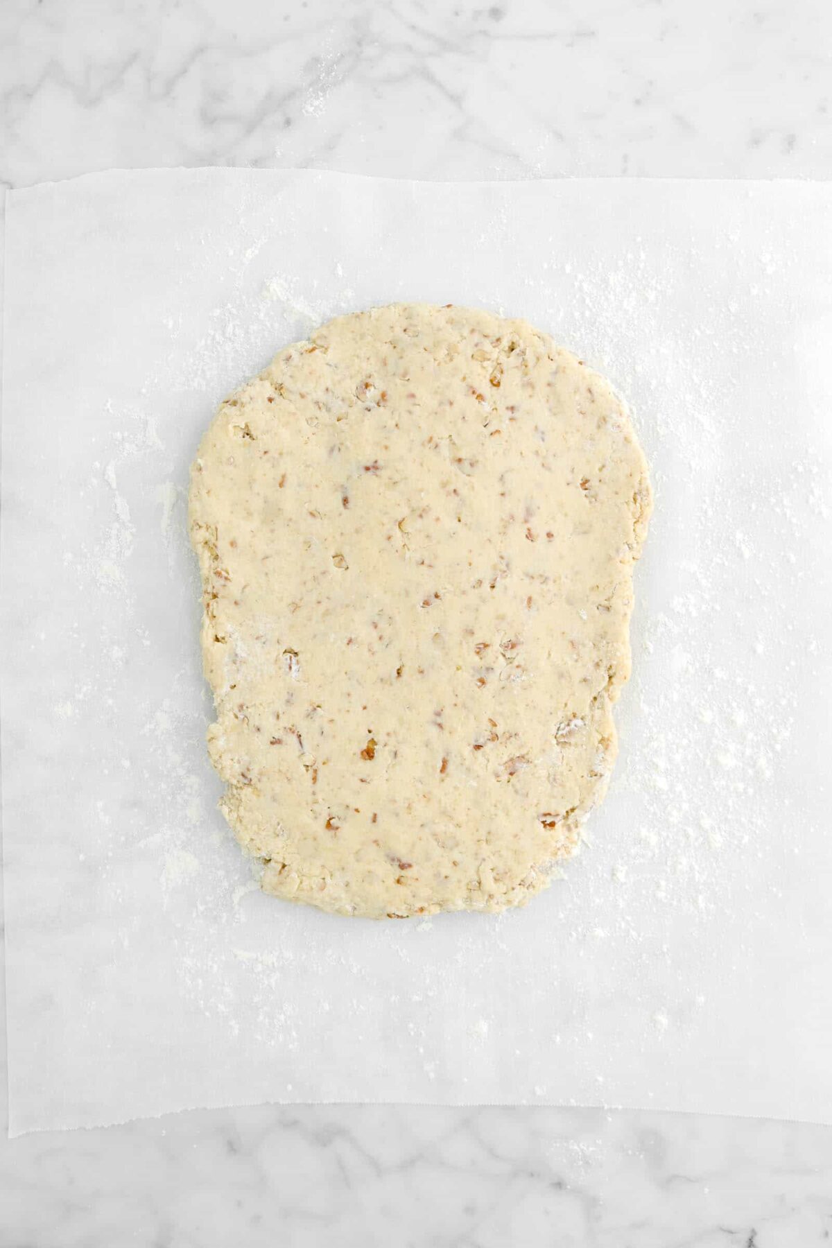 scone dough rolled out into an oval
