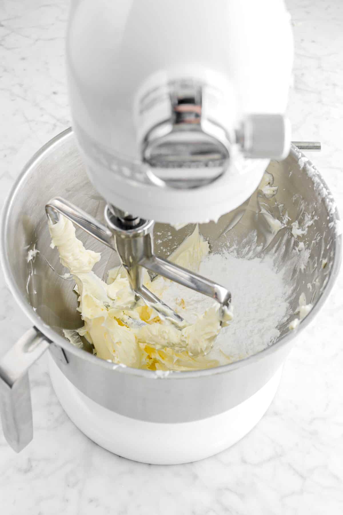 powdered sugar and butter in mixer bowl
