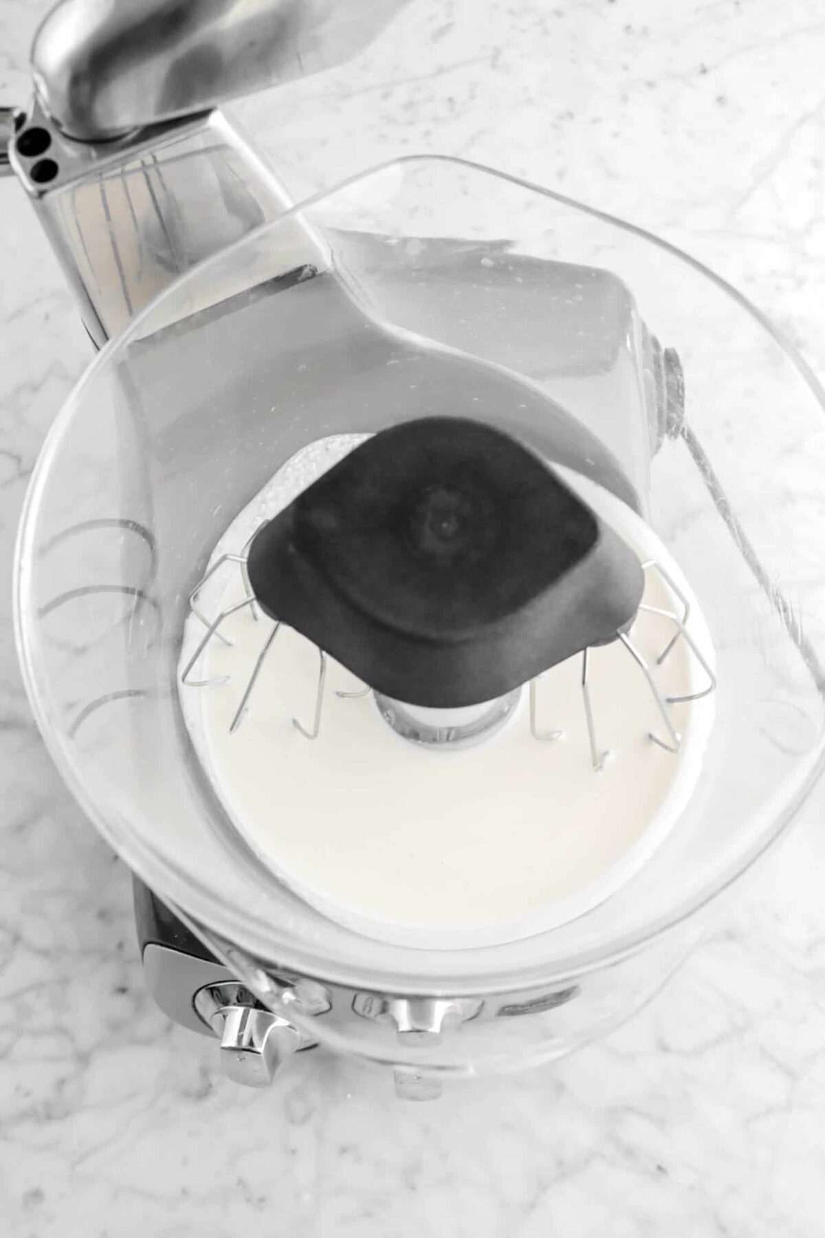 heavy cream in mixer with whisk attachment