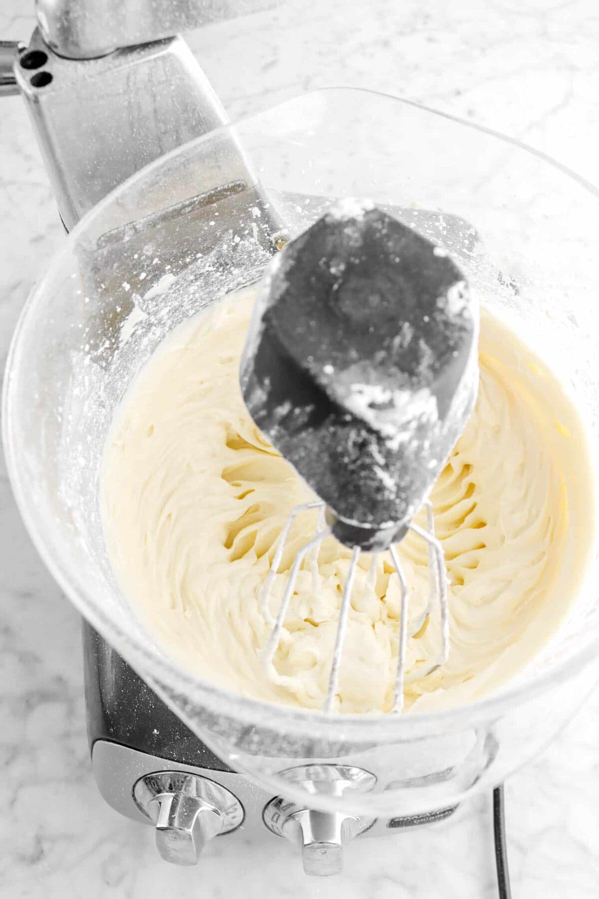 cream cheese frosting in mixer bowl