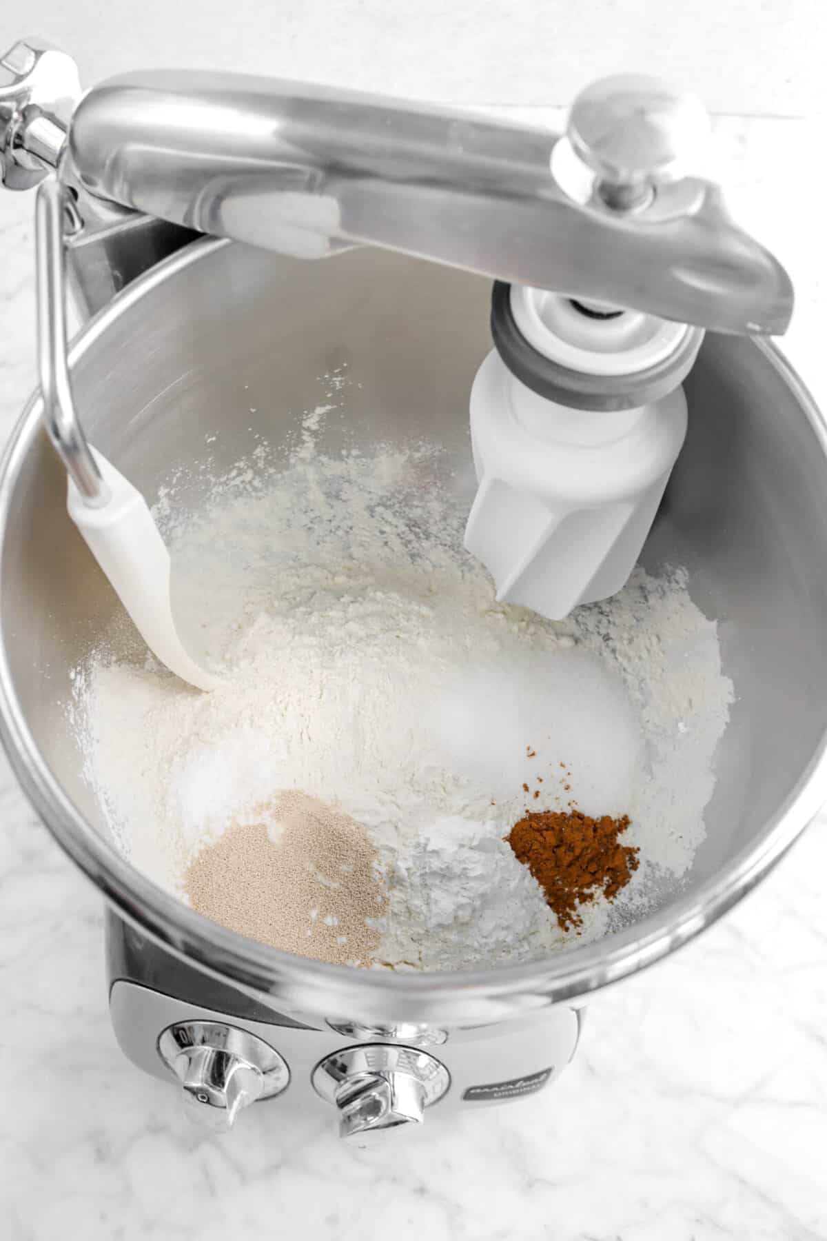 flour, spices, yeast, salt, and sugar in a mixer