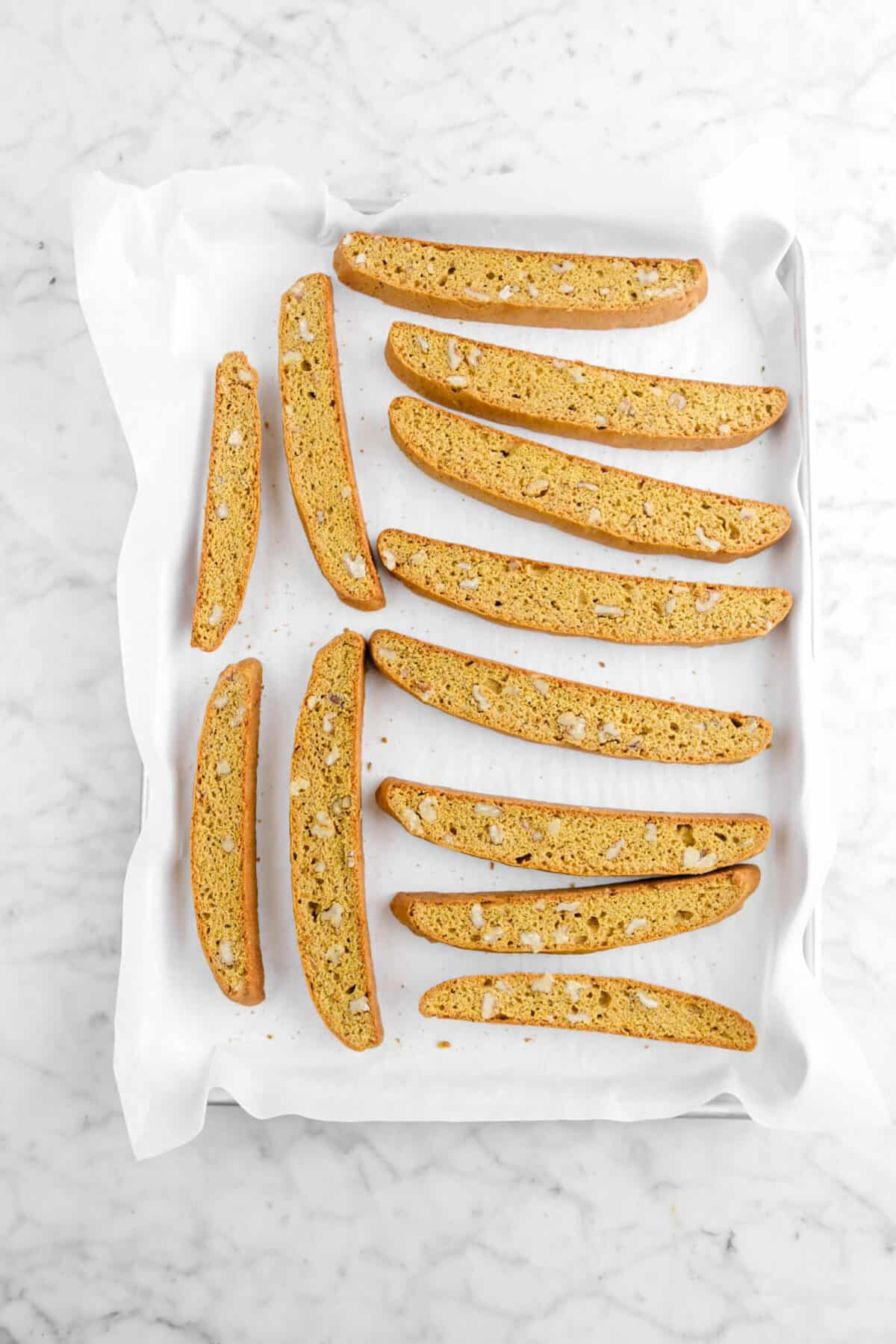 baked biscotti slices on pan