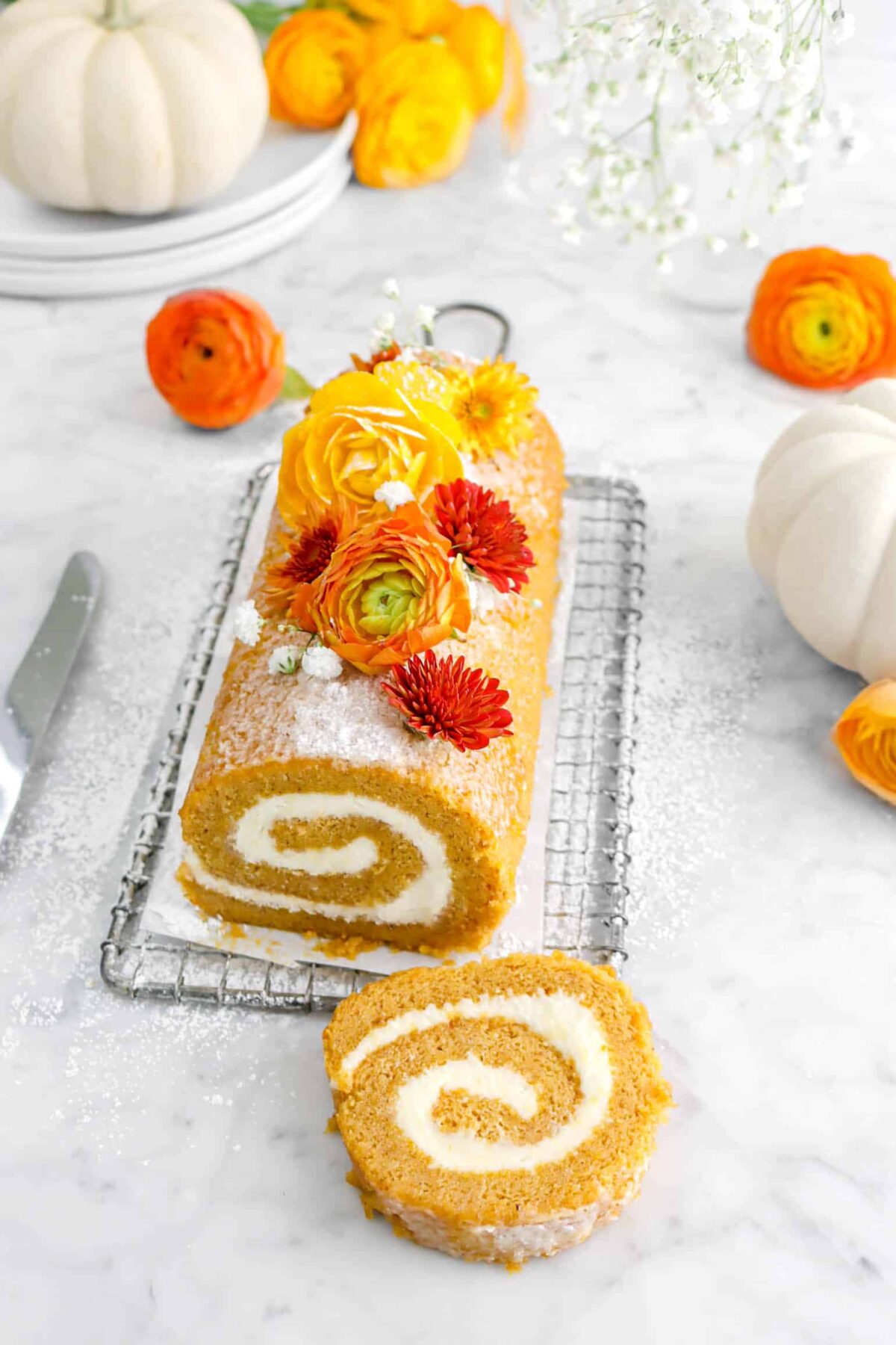 pumpkin roll with slice laying in front